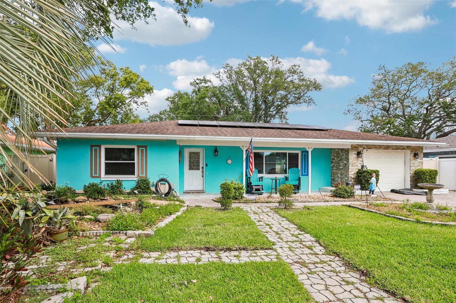 This is the one you have been waiting for. Just 1/2 mile from Downtown Dunedin's iconic Main Street, steps from Blue Jays spring training, and nestled in a golf cart zone — 657 Marjon Ave puts you at the center of everything that makes Dunedin one of Tampa Bay's most coveted addresses. Inside, 1,240 sq ft of thoughtfully updated living space awaits with zero deferred maintenance. Solar conveys fully paid off at closing — lower your bills before you unpack. Stunning updated kitchen with 2026 appliances, fresh backsplash, and climate-controlled sunroom. PGT WinGuard hurricane impact windows and doors with a lifetime warranty. All new electrical wiring and breaker box with smart switches. 5-zone irrigation. A/C and ductwork 2024. Tankless water heater 2025. Private fenced backyard. Flood Zone X — no flood insurance required. Homes like this do not last.