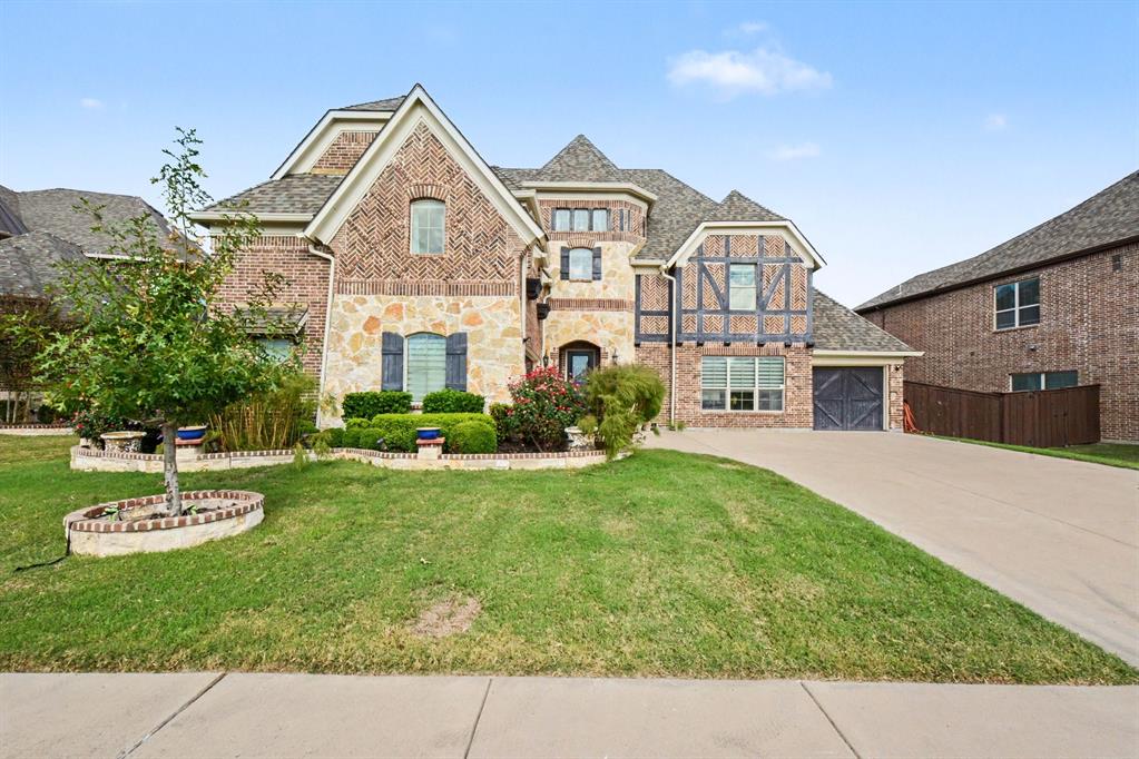 Welcome to this beautiful home featuring a grand entry with a striking double staircase! The main level offers a formal dining room, private office, and full bath. The spacious kitchen overlooks the large living room with a cozy fireplace and features an eat-in area, bay window seating, island with bar seating, and included dishwasher, disposal, oven, and refrigerator. Convenient storage is tucked beneath both stairwells. The primary suite features bay window seating, dual vanities, soaking tub, glass-enclosed shower, and a large walk-in closet. Upstairs, enjoy a game room and media room plus 3 bedrooms and 2 full baths. LVP flooring extends throughout the bedrooms, with tile in the bathrooms. Plenty of space for family living and entertaining!