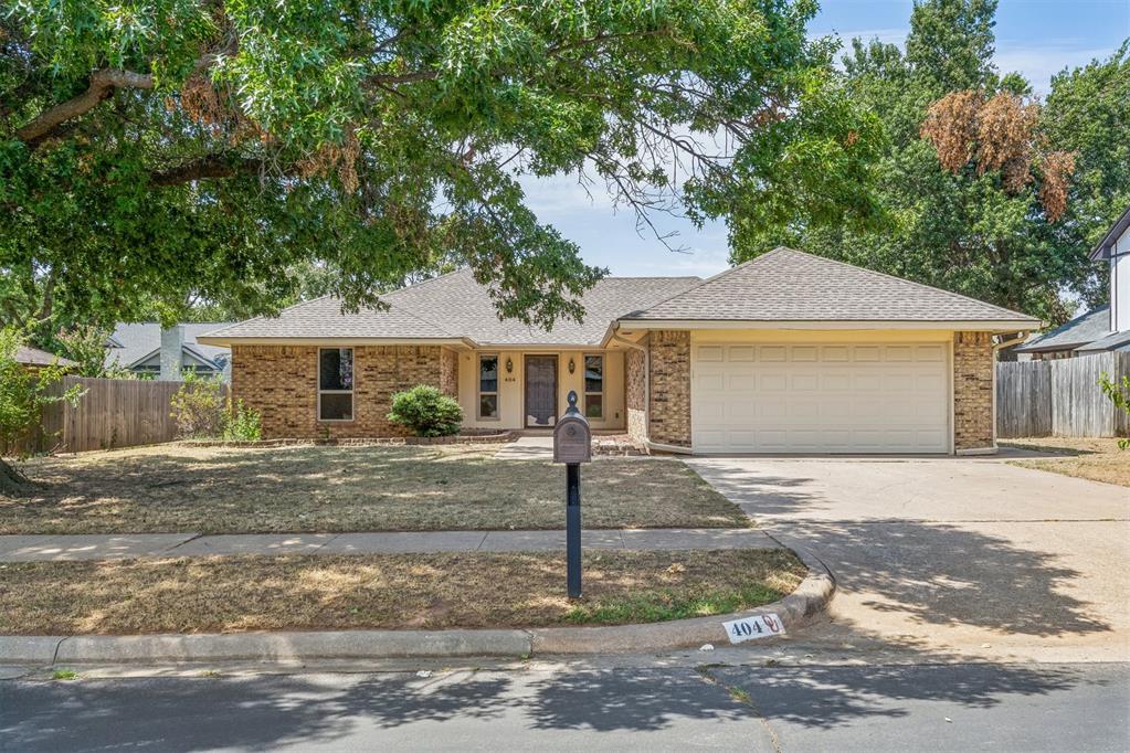 Looking for a great investment property or something nostalgic? Welcome to this classic-styled home in the desirable Quailbrook Addition on the westside of Norman! This well-maintained 3-bedroom, 2-bath home offers a functional floor plan with a 2-car garage, comfortable living spaces, and a great blend of classic charm and modern updates. Step inside through the tiled foyer and discover a welcoming interior featuring carpet, tile, and attractive wood-like tile flooring. The living room showcases a woodburning fireplace with built-in cabinetry, creating a warm and inviting gathering space. A separate dining room provides a dedicated area for meals and entertaining. Two-inch wood blinds throughout add timeless appeal, while textured ceilings complement the home's classic character. The kitchen features recently upgraded appliances, including a new dishwasher, offering added convenience for everyday living. Major improvements include a new HVAC and furnace, along with a 4-year-old roof, providing valuable peace of mind. The spacious primary bedroom offers private access to the backyard and connects to a remodeled primary bathroom featuring a beautifully updated shower, dual vanity sinks, and matching mirrors. A separate laundry room adds functionality and storage to the home. Outside, enjoy nice front and backyards shaded by mature trees. The covered patio provides an excellent space for BBQs, outdoor dining, or relaxing with family and friends. An outdoor storage building offers additional room for tools, lawn equipment, hobbies, and seasonal items. Conveniently located in the established and sought-after Quailbrook Addition on Norman's westside, this home is close to entertainment, shopping, restaurants, and everyday conveniences. With its classic style, recent updates, mature landscaping, and desirable location, this home offers comfortable living in a well-established Norman neighborhood.