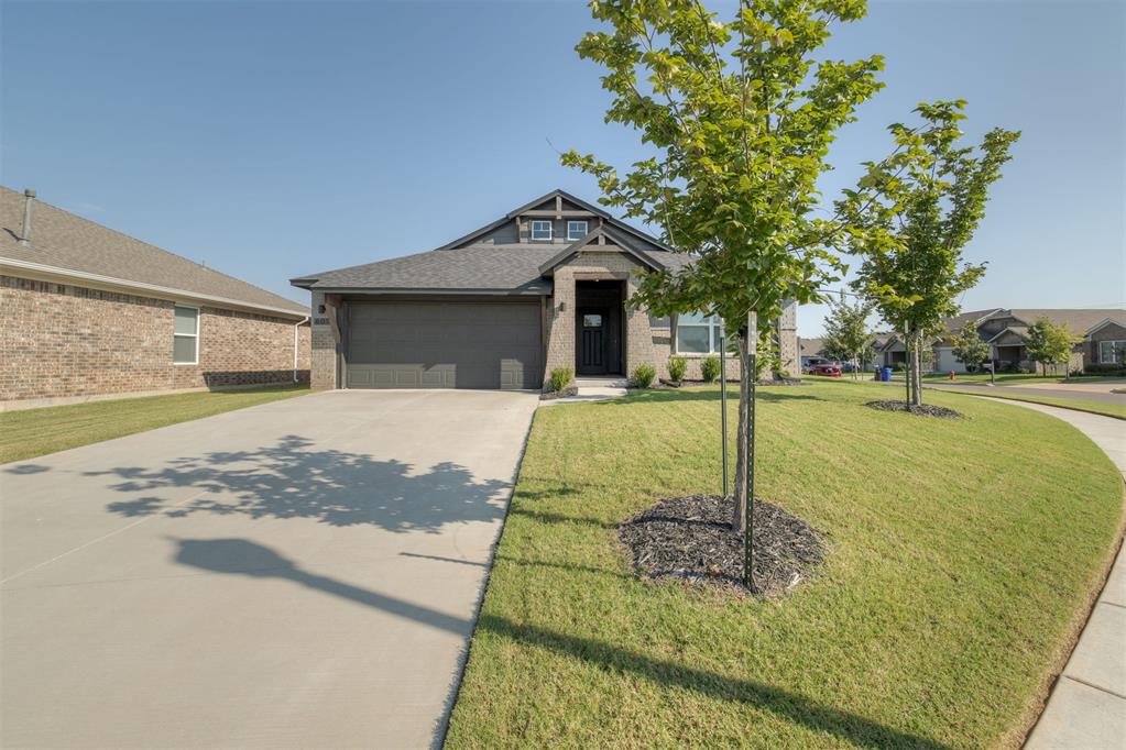 3D Matterport Tour available! 
Experience the best of easy living in this immaculate, like-new home located on a corner lot! Built in 2021, this property has been lightly lived in and features thoughtful upgrades like a full sprinkler system.
From the moment you enter, LVP flooring guides you into a bright and airy living area. The open-concept kitchen and living space is the heart of the home, featuring a large island with bar seating, a true dining area, pantry space, and a gas range. The stylish kitchen also boasts quartz counters and elegant champagne gold hardware & kitchen faucet. 
The primary suite is a private retreat at the back of the house with a spacious en suite bathroom that includes spacious shower and excellent closet space. Two additional bedrooms are located on the opposite side of the home, offering privacy and a perfect setup for guests or a home office. Laundry room is located just off the garage but enclosed in its own space so you're able to close off if needed and keep out of sight for guests - ideal! 
Step outside to a covered patio and a fully fenced backyard. The yard is equipped with a sprinkler system—a valuable upgrade for keeping your lawn lush and green all summer.
The neighborhood's location is ideal, providing easy access to the University of Oklahoma, the core of Norman, and I-35 for a quick commute to Oklahoma City. Residents enjoy fantastic amenities, including a splash pad, park, and walking trails that lead around multiple neighborhoods!
Don't miss this opportunity to own this hard to find floorplan in a built-out community - schedule your private showing today!
