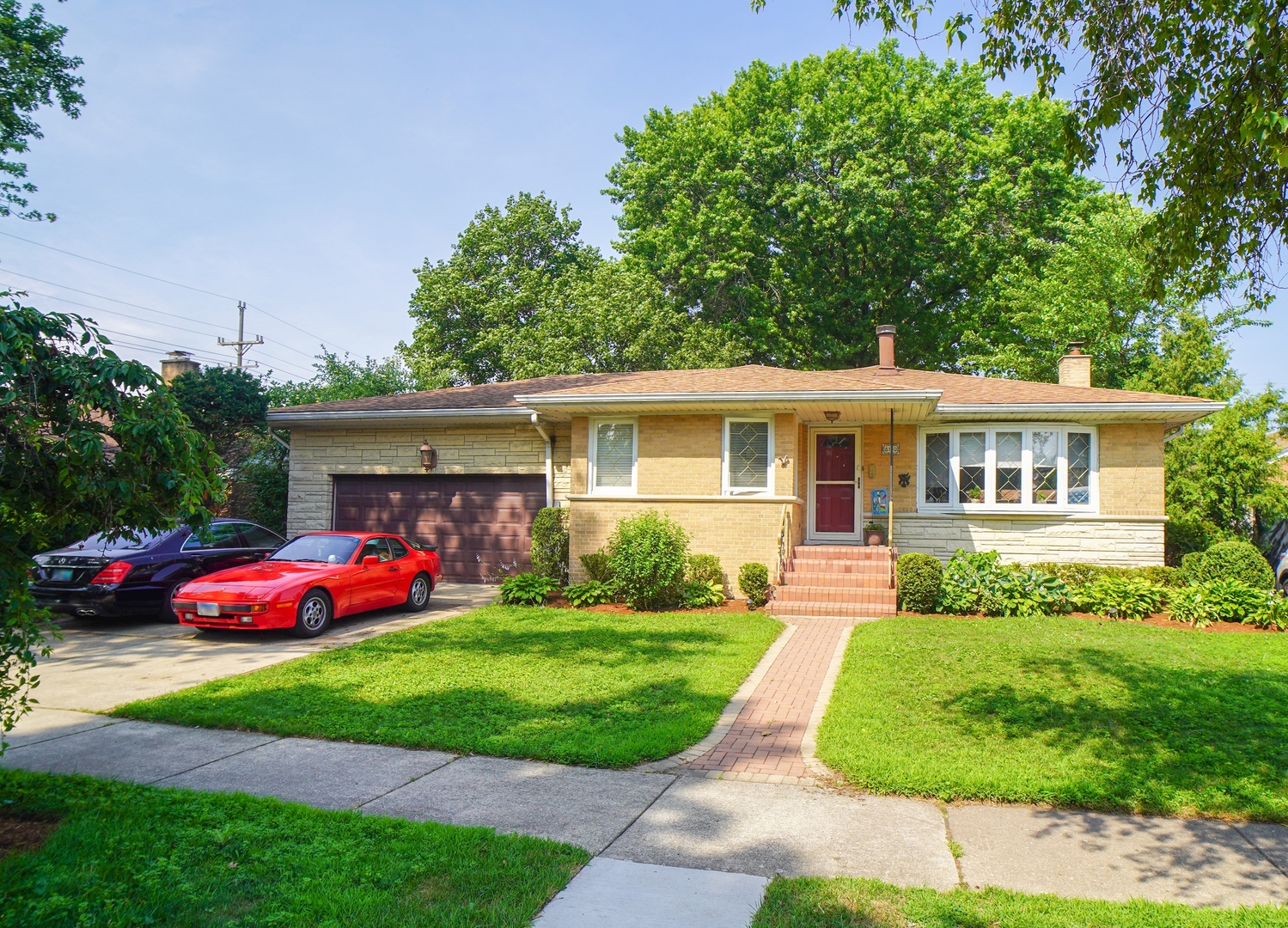 Beautifully Updated Brick Step Ranch with In-Law Suite in Prime Skokie Location! This solid, well-maintained home features 5 bedrooms (3 on the main level, 2 in the finished basement), 3 full baths, and an attached 2-car garage. Enjoy the open-concept granite kitchen with stainless steel appliances, white wood cabinetry, pantry, and eat-in area-perfect for entertaining. Hardwood floors throughout the main level, a spacious formal dining room, and a large living room with a cozy fireplace create a warm and inviting atmosphere. The professionally landscaped backyard is an outdoor oasis with an oversized deck, gazebo, and a huge hot tub for year-round relaxation.  The fully finished basement offers a separate in-law suite with 2 additional bedrooms, a full bath, a generous family room, laundry area, and plenty of storage. Located in a desirable Skokie neighborhood near top-rated schools, parks, shopping, restaurants, and transportation. Skokie provides free curbside garbage collection for added convenience. This lovingly cared-for home is freshly painted, spotless, and move-in ready. Just unpack and enjoy!