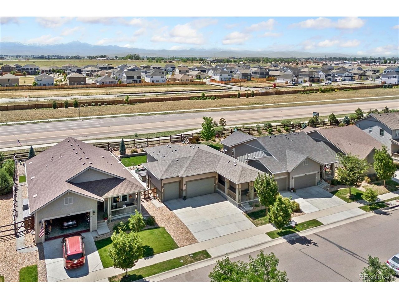 Resort-style luxury at Barefoot Lakes! Designed for comfort and easy single-level living, this pristine ranch home delivers a functional layout paired with premier access to a vibrant, amenity-rich community. Located just minutes from The Cove, residents can enjoy a beach-entry pool, lap lanes, a splash pad, and a state-of-the-art fitness center, plus endless opportunities for fishing, kayaking, and paddleboarding at The Lakes south of the neighborhood. The home also has amazing features including a chef's kitchen package with double ovens, an upgraded dishwasher, and two pantries, along with smart home readiness and a security system for added convenience. An inviting entry hallway leads into a spacious main living area filled with vibrant natural light, creating an easy flow for daily routines. The split-bedroom layout offers two bedrooms plus a bonus office that can easily serve as a flexible third bedroom or hobby studio. Outside, the professionally landscaped backyard features a custom paver patio, a cozy firepit, an included hot tub, and beautiful mountain vistas, creating a private retreat right at home. The refrigerator, freezer, and mounted TVs are all included, making this property truly move-in ready. For vehicles and gear, the 3-car garage boasts built-in shelving that stays with the home, offering excellent organization. Enjoy quick access to I-25 and nearby amenities while being surrounded by wide-open spaces and scenic front-range views, all within Firestone's premier master-planned community.