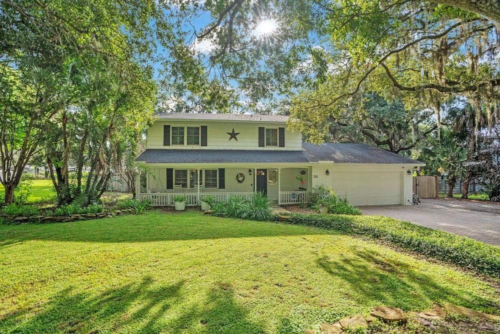 Timeless Charm in the Heart of Downtown Windermere. Nestled beneath a canopy of majestic oak trees on one of Windermere’s most picturesque streets, this beautifully maintained three bedroom, two and half bath residence offers the perfect blend of classic Florida charm and modern comfort. Situated on a spacious 0.38 acre fenced homesite, this exceptional property features 2,795 square feet of living space and 4,163 total square feet, providing plenty of room to live, work, and entertain. From the moment you arrive, you will appreciate the peaceful setting and inviting curb appeal that make Oakdale Street one of the town’s most desirable locations. Inside, thoughtful craftsmanship is evident throughout with custom trim work, rich stone and wood flooring, double pane windows and doors, and a warm family room centered around a natural gas fireplace. The well appointed kitchen features a natural gas range, while the expansive air conditioned Florida room offers the perfect place to relax year round as you overlook the private backyard. Car enthusiasts, hobbyists, and those needing extra space will love the 4 car garage along with the detached air conditioned building, ideal as a home office, fitness studio, art studio, workshop, guest retreat, or whatever your heart desires. Recent improvements provide peace of mind, including: Roof replaced in 2019, newer HVAC system and water heater (4 years old) and a newer well pump (9 months old). Living in the Town of Windermere is more than owning a home, it’s embracing a lifestyle. Enjoy the beloved weekly farmers market, monthly food truck nights, festive holiday celebrations, and a charming downtown just a short walk away featuring a new Italian restaurant, breakfast café, coffee shop, wine bar, tennis courts, and more. Residents also enjoy exclusive access to community boat ramps on both Lake Butler and Lake Bessie, making it easy to experience the renowned Butler Chain of Lakes. If you have been searching for a home that offers character, generous space, exceptional flexibility, and one of Central Florida’s most treasured small town lifestyles, this is an opportunity you won’t want to miss. Be sure to click on the virtual tour links.