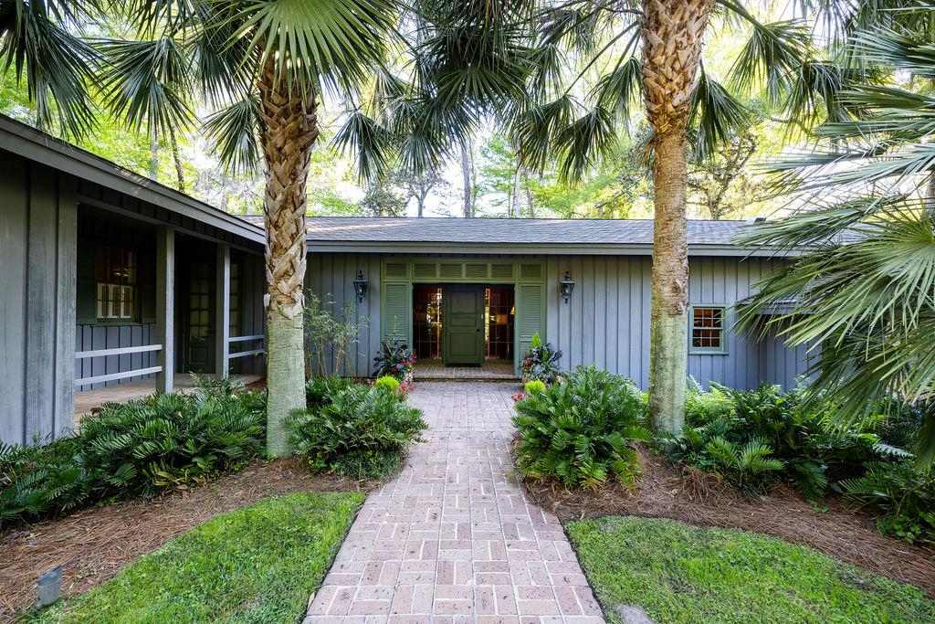 Mill Creek represents an extremely unique opportunity to own a private estate located just minutes away from historic downtown Thomasville. Constructed in 1963, the house is a testament to the timeless contemporary design of Frank McCall, a highly regarded area architect. Situated on almost 10 acres, Mill Creek is positioned on a small bluff in a tree shaded canopy overlooking the stream. The house is constructed of premium materials including Redwood siding and Ocala limestone, with expansive windows that flood the house with natural light and bring the outside in. Interior details include a wood paneled study, reclaimed beaded board, heart pine and hardwood flooring, and select custom millwork throughout. Four large masonry fireplaces add to the warmth, comfort and substance of the 5 bedroom, 4.5 bath home. The gracious kitchen and butler's pantry have been completely renovated in recent years with solid surface granite countertops, custom cabinets, and professional grade stainless appliance. The kitchen also incorporates a casual dining area and comfortable den. Formal dining and living rooms are ideal for entertaining, and open to a large wraparound deck that is utilized for year around enjoyment.   The grounds at Mill Creek have been professionally landscaped and beautifully maintained. The expansive lawn incorporates towering pines, palms, citrus trees, azaleas, camellias, and raised garden beds. The long driveway creates a dramatic approach past cypress trees and yellow iris as it crosses the bridge and provides a glimpse  of the house beyond.  Located in the desirable Gordon Avenue District, Mill Creek is a true rarity given the privacy and seclusion it provides relative to its close proximity to town, the hospital, the country club and other amenities. With too many features and upgrades to mention, this property must been seen to truly appreciate.