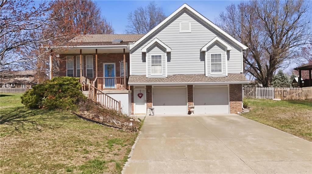 3 bedroom raised ranch is located in this very desirable Raintree Lake community. Home offers a wonderful main level living floor plan with a cozy fireplace in the great room. Luxury vinyl flooring elevates in entry, great room & kitchen/dining areas.  The master bathroom is getting new vanity soon. Lower level has partly finished basement with sauna and potential half bath. On same level is extra large 2 car garage that could hold 3 cars. Backyard is level, spacious and fenced. Home has 1 year home warranty. Conveniently located near the community pool and public lake access makes for a fun summer.