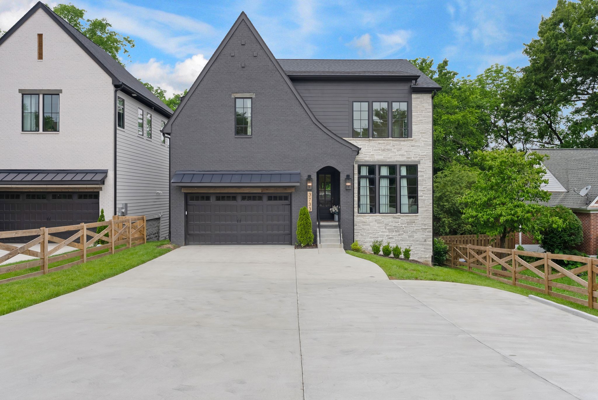Where Sophistication Meets Southern Charm in the Heart of Green Hills!   Tucked beneath a canopy of mature trees on one of Green Hills’ most desirable streets, this show stopping luxury home by Broadway Building Group blends modern elegance with timeless design. Featuring 4 spacious bedrooms (with the flexibility to convert a 5th), 4.5 beautifully appointed baths, and a 2-car garage, this residence offers both form and function.  Step inside and be greeted by rich designer finishes, a gourmet chef’s kitchen outfitted for entertaining, and a walk-in pantry that’s as practical as it is stylish. The open-concept living area flows seamlessly onto a covered deck, perfect for al fresco evenings or cozy mornings with coffee. Whether you need a space to sweat or stream, the exercise/media room adds versatility for today’s dynamic lifestyles.  From thoughtful layout to upscale details, don’t miss the chance to make this Green Hills gem your own.
