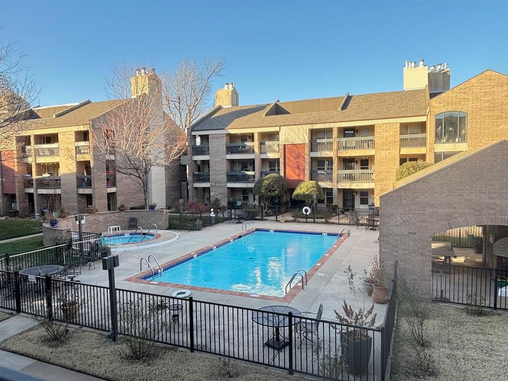 Beautifully updated condo, ideally located at the end of the walkway for added privacy and featuring a great view of downtown OKC. Major systems have been fully updated, including a new water heater, new HVAC, and a new electrical panel with modern GFCI protection built directly into the breakers. The renovated kitchen is thoughtfully designed with an induction cooktop that heats and cools quickly and is exceptionally easy to clean. If you've never used one try it out while you're viewing the property.  Also included are a full length pantry featuring pullout shelves that provide abundant, easily accessible storage and a stain and scratch resistant porcelain sink. Durable flooring runs throughout the unit and includes sound-reducing underlayment, helping minimize noise transfer to the unit below.The primary bedroom offers a comfortable retreat with a walk-in shower that adds both style and convenience. With its combination of high-quality updates, smart storage, and a quiet, private location within the community, this condo presents an excellent opportunity for low-maintenance living in the heart of the Oklahoma City.