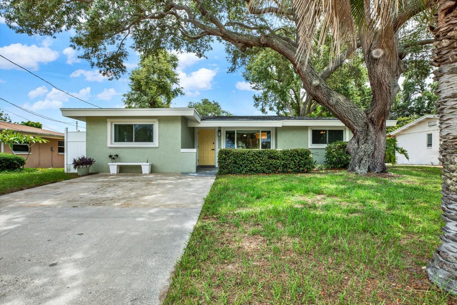 WELCOME HOME TO THIS CHARMING AND WELL-MAINTAINED 3-BEDROOM, 1.5-BATH SINGLE-FAMILY RESIDENCE LOCATED IN UNINCORPORATED PINELLAS COUNTY! From the moment you arrive, you'll appreciate the home's inviting curb appeal and welcoming presence. Inside, the OPEN-CONCEPT FLOOR PLAN creates a bright and spacious atmosphere, perfect for both everyday living and entertaining guests.The garage has been thoughtfully converted into a VERSATILE BONUS ROOM that’s currently utilized as a 3rd bedroom but could easily serve as a home office, playroom, fitness room, or additional living space. For those needing garage parking or extra storage, the space can be converted back to its original use.THIS HOME OFFERS NUMEROUS VALUABLE UPDATES, INCLUDING A BRAND-NEW ROOF INSTALLED IN 2024, UPDATED PLUMBING, HURRICANE SHUTTERS, AND WINDOWS AND DOORS REPLACED IN 2014, ENHANCING BOTH ENERGY EFFICIENCY AND CURB APPEAL. When the roof was replaced, the seller also added the third nail to the roof decking attachment, helping improve wind mitigation features and potentially reducing insurance costs. For added peace of mind, a RECENT FOUR-POINT INSPECTION WAS COMPLETED AND PASSED.LOCATED IN A NON-FLOOD ZONE, THIS PROPERTY EXPERIENCED NO HURRICANE DAMAGE, offering additional confidence and peace of mind for future owners. Situated in Unincorporated Pinellas County, the property currently offers NO MINIMUM RENTAL RESTRICTIONS, creating excellent flexibility for homeowners and investors alike.Conveniently located near shopping, dining, parks, top-rated Gulf beaches, and major roadways, this move-in-ready Largo home offers comfort, functionality, and exceptional value. Whether you're a first-time homebuyer, seasonal resident, or investor, this is an opportunity you won't want to miss!