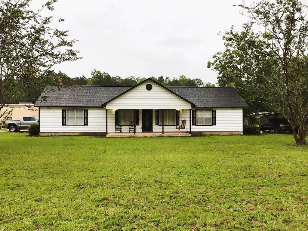 Escape to the peace and quiet of country living with this charming 3 bedroom, 2 bath home nestled on 8 beautiful acres. Offering 1,575 square feet of comfortable living space, this property provides the perfect blend of privacy and practicality. The home features a welcoming layout with plenty of room to relax and unwind, while outside you'll find endless possibilities. A spacious 50 x 40 wired shop is ideal for hobbies, storage, or a home-based business. There's ample space for a garden, animals, or simply enjoying the open land and fresh air. A wet-weather pond sits in the front yard, adding to the property's natural charm (currently dry due to drought conditions). Located on a quiet dirt road, this property offers a peaceful, tucked-away setting while still being within reach of nearby conveniences. 2.6 acres in the very back of property is in a conservation easement. If you're looking for room to grow and a slower pace of life, this property is a must-see! Can be purchased with 1325 Convick Circle and additional 16 acres for additional price.