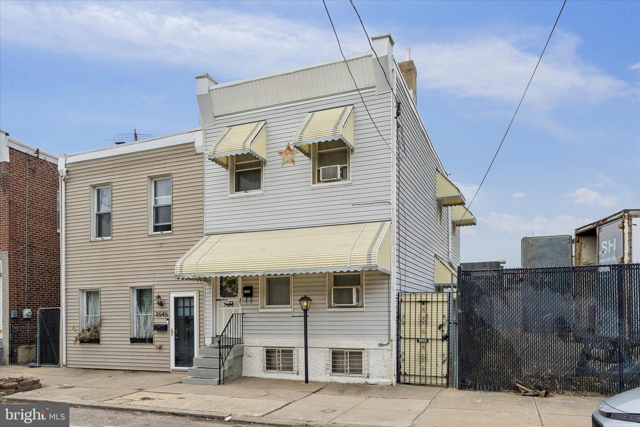 **LOVINGLY MAINTAINED 3 BED/1 BATH END OF ROW HOME OFF ARAMINGO WITH MASSIVE YARD**This beautiful home has had the same owner for over 60 years. When you enter the foyer, you know it is special. The living/dining area is welcoming and ready for your furnishings. The crisp white paint and side windows keep things very bright. The kitchen is eat-in, fitted and unfitted at the same time with cabinetry on one side and room for stand-alone pantries or whatever you envision for your perfect layout. Beyond the kitchen is a true stand out. The massive patio is wonderfully paved and landscaped and will provide a true retreat in all weather. Upstairs there are 3 true-sized bedrooms and a full hallway bath equipped with a nice shower/tub combo, toilet and vanity. The property as a bonus has a side gated entrance allowing for ease of traffic to your patio for gatherings or for bringing large items in. The basement is nice, clean, dry and good for storage and houses all the mechanicals. The property is being sold in as-is condition. It is truly a wonderful home right off of Aramingo Avenue and convenient to just about everything one could need within a short distance. Schedule your showing today or call for a private tour.