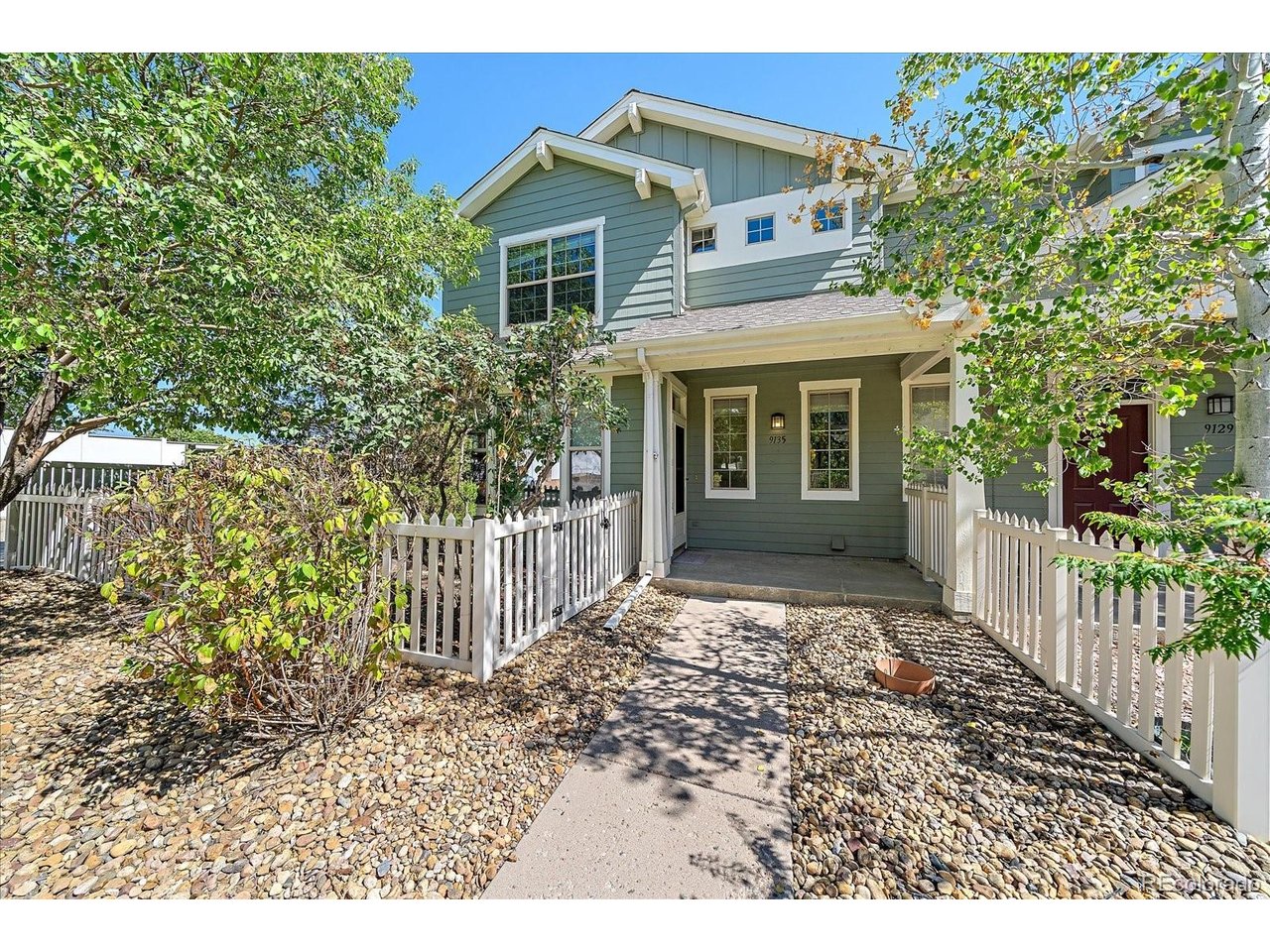 Rare opportunity to own a paired home in Walnut Grove! This end-unit offers a fenced yard that wraps around the front and side of the home, along with a welcoming front porch and plenty of outdoor space to enjoy. The main level features a bright family room with lots of windows on the north and west sides of the home. The dining room is adjacent to the kitchen, which has an abundance of cabinet space, including a convenient buffet, and a slider that opens to the side yard. The laundry and powder room are located together, and the washer and dryer are included. Upstairs are three bedrooms, including a spacious primary suite with three windows, a ceiling fan, and an adjacent 3/4 bath. The primary bath features double sinks, a large walk-in closet, and a walk-in shower with a built-in bench. The two secondary bedrooms have reach-in closets and the full hallway bathroom has natural light. The attached garage is an especially nice feature, offering a large bump-out that makes it feel almost like a 2 1/2 car garage and provides excellent additional storage space. Some windows have also been replaced. The HOA covers exterior building maintenance. Located near 108th and Wadsworth with easy access to US 36, plus grocery stores, shopping, restaurants and other amenities nearby. Paired homes in Walnut Grove don't come along often, and this one is an end unit with a fenced yard, generous garage storage and a functional floor plan. Be sure to check out the floor plans included with the photos and the 3D tour for a closer look!