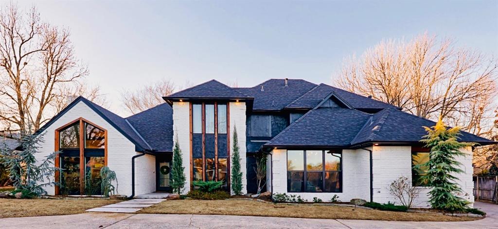 ***Updated photos coming after the snow melts.*** This home has been thoughtfully renovated from top to bottom with high-end finishes and exceptional attention to detail. Updates include a new roof (2023), all-new sheetrock and insulation, updated plumbing, new cabinetry, and designer light fixtures throughout. In December, the garage was converted from a back-entry to a side-entry layout, allowing for the removal of excess concrete and creating a huge backyard with plenty of room for a pool and outdoor entertaining. Inside, the flexible floor plan offers three bedrooms plus a massive upstairs bonus room and the primary suite. The layout allows for either a split living and dining arrangement with a dedicated office, or a spacious living area with formal dining. Built for entertaining, the open-concept design features a large kitchen island, a built-in commercial refrigerator and freezer with water and ice maker, a ZLINE designer oven, soft-close full-extension drawers and doors, and abundant built-ins and storage closets. Additional highlights include light-colored real maple wood floors, hand-laid herringbone shower tile, and 12-foot sliding glass doors that open to a large vaulted back patio. Listing agent is owner.