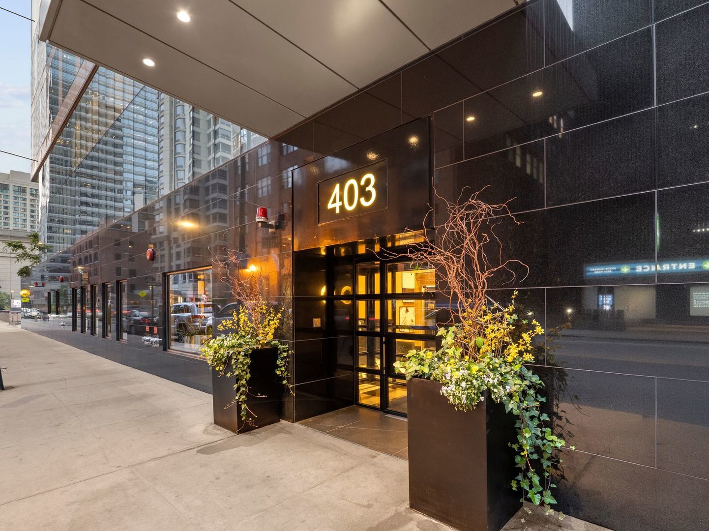 Experience refined city living in Penthouse 17C at 403 N Wabash Avenue, a residence where thoughtful design meets timeless elegance. Welcome to Renelle on the River, one of Chicago's most sought-after boutique buildings, crafted by the renowned bKL Architecture and Belgravia Group's award-winning 50-unit development.    This stunning 3-bedroom, 3-bathroom home offers elevated living in a premier location. The moment you step inside, you're greeted by breathtaking views of the Chicago River and skyline, framed by expansive floor-to-ceiling windows. The open-concept layout is both functional and sophisticated, featuring wide plank hardwood floors and a seamless flow between the living, dining, and kitchen areas.    The chef's kitchen is outfitted with sleek Snaidero cabinetry, one-of-a-kind sueded marble countertops, and top-tier Wolf and Sub-Zero appliances, all complemented by a private covered balcony.    The primary suite is a serene retreat, enhanced by elegant custom fluted millwork. It features a spacious California walk-in closet with leather-finished cabinetry and a spa-inspired bathroom complete with dual vanities, heated floors, a freestanding soaking tub by Victoria + Albert, and a separate glass-enclosed shower.    Two additional bedrooms provide versatility for guests, a home office, or extended family, with the second bedroom offering its own en-suite bath.    Additional highlights include a tandem parking space in the secure, heated garage and access to an exceptional collection of luxury amenities. Enjoy an unforgettable penthouse-level rooftop lounge and terrace with a fireplace, indoor and outdoor kitchens, and private screening and game rooms. The building also features a fitness center with a dedicated yoga room, bike storage, an outdoor dog run, and 24-hour door staff for added convenience and peace of mind.    Penthouse 17C offers a rare blend of privacy, sophistication, and convenience just steps from Chicago's premier shopping, dining, and cultural destinations. This is a home you don't want to miss!