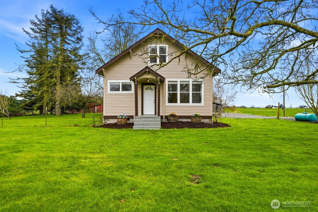 Idyllic country hobby farm set in the heart of Skagit Valley with stunning sunsets and wide-open territorial views. This versatile property offers the perfect blend of rural charm and functional space, ideal for those seeking a country lifestyle, small farm, or room for hobbies and equipment.  Features include a detached garage, expansive 26x60 shop/shed, and a well-maintained 3-stall barn with tack room, covered parking, and a small riding arena—perfect for horses or livestock. The layout also lends itself well to auto enthusiasts, contractors, or anyone needing ample storage for vehicles, tools, or recreational equipment. The level acreage provides usable ground for animals, gardening, or simply enjoying the peaceful setting. Plenty of space for RV parking and additional outbuildings if desired.  Conveniently located yet offering a private, rural feel, this is a great opportunity to create your own country retreat or working hobby farm.
