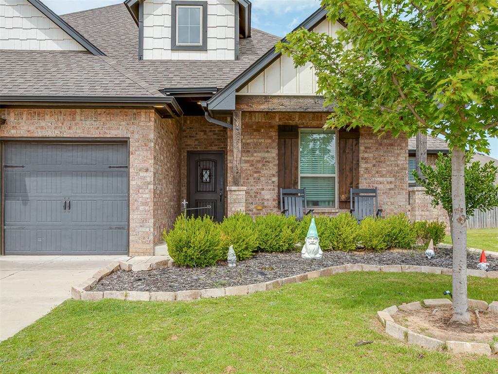 Luxury, comfort, and thoughtful design come together in this exceptional 4-bedroom, 3-bath home! Offering over 2,500 square feet of total living space, including 2,352 square feet indoors and over 220 square feet of covered outdoor living, this home is loaded with premium features you'll love.  From the moment you step inside, you'll appreciate the bright, open floor plan that's perfect for entertaining and everyday living. The spacious living room showcases soaring windows, a stunning stacked stone gas fireplace, and a stylish barn door, creating a warm and inviting atmosphere. The gourmet kitchen is a dream for any home chef, featuring ceiling-height cabinetry, gorgeous 3 cm quartz countertops, a designer backsplash, stainless steel appliances, a stainless steel sink, and an abundance of storage and workspace.  Escape to the luxurious primary suite, complete with a boxed ceiling, spa-inspired bathroom featuring dual vanities, a relaxing Jetta whirlpool tub, a large walk-in shower, and an oversized walk-in closet with direct access to the utility room for ultimate convenience. Step outside to your covered back patio, where a cozy fireplace, gas line, and cable hookup create the perfect setting for year-round entertaining, game days, or relaxing evenings with family and friends. Additional highlights include a 3-car garage with an installed storm shelter, whole-home air purification, a Rinnai tankless water heater, R-44 insulation, and Solar Board, radiant barrier sheathing for superior energy efficiency and lower utility costs. Neighborhood Pool and playground with maintained common areas. This home truly offers the perfect blend of style, comfort, and modern efficiency. Don't miss your opportunity to make it yours—schedule your private showing today! Floor plan in documents!