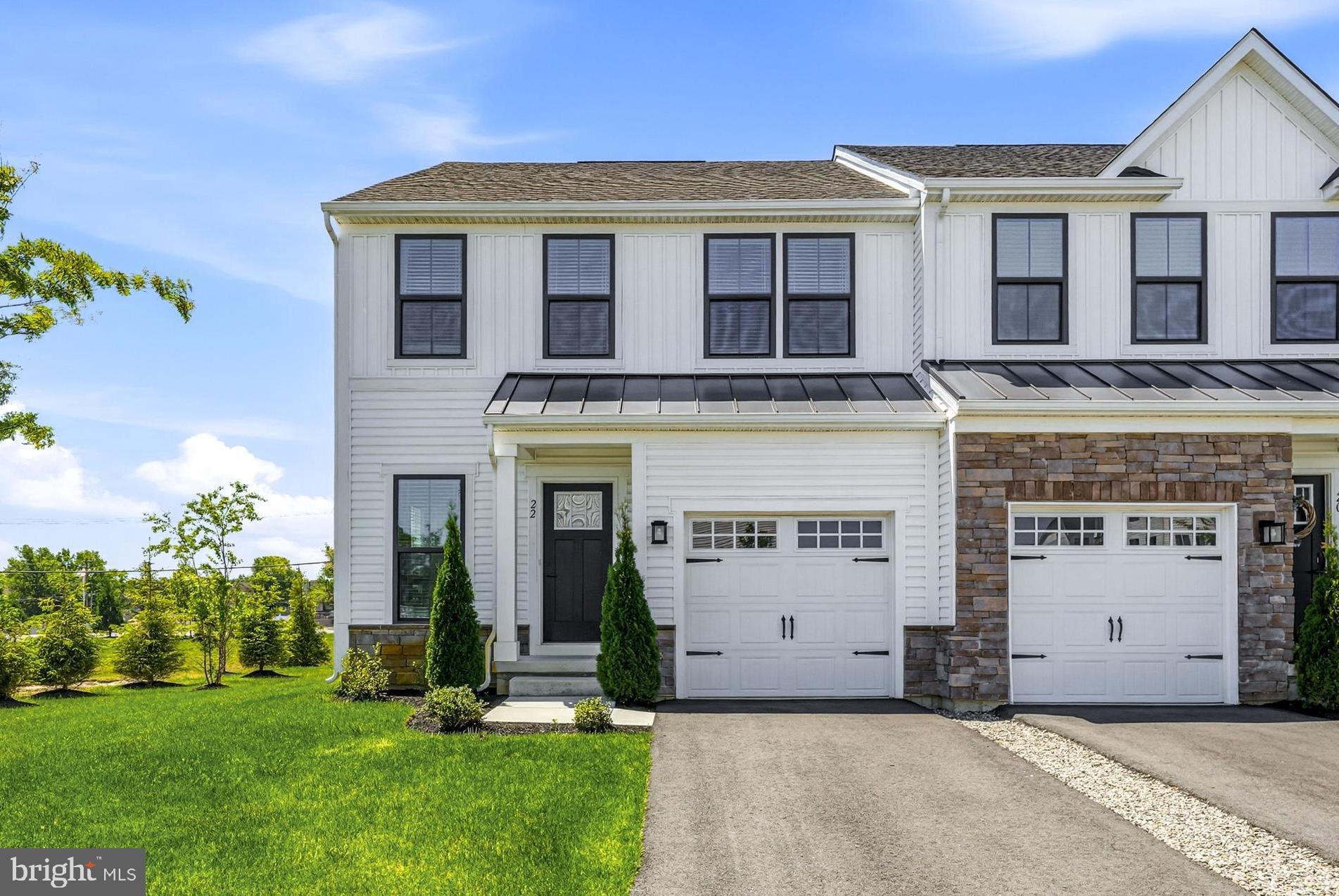 Welcome to Laurel Point in Mount Laurel! Built in 2024, this stunning end-unit townhome offers the perfect blend of modern luxury, thoughtful design and spacious living. This colonial-style home features 3 bedrooms, 3.5 bathrooms, and three levels of beautifully finished living space. Loaded with premium upgrades throughout, it offers the perfect blend of style, comfort, and functionality. Step inside to an open-concept main level featuring 9-foot ceilings, hardwood flooring, hardwood stairs with wrought iron railing, and upgraded custom light fixtures that add warmth, character, and timeless sophistication. The gourmet kitchen is a true showstopper with a 5-burner stove top, double wall oven, ample cabinetry, and an open layout ideal for entertaining. The spacious living and dining areas flow seamlessly to a private Trex deck, perfect for relaxing, grilling, or enjoying your morning coffee. Upstairs, the primary suite offers a luxurious retreat with a beautifully appointed en-suite bath that features a Roman shower and generous closet space, while two additional bedrooms, a full bath, and a convenient second-floor laundry room complete the upper level. The finished basement with full bathroom adds incredible flexibility and can easily serve as a 4th bedroom, guest suite, home office, gym, playroom, or recreation space. Located in the sought-after town of Mt. Laurel, this nearly new home combines modern finishes, functional space, and an unbeatable location close to shopping, dining, major highways, and top-rated schools. Move right in and enjoy luxury living without the wait for new construction!