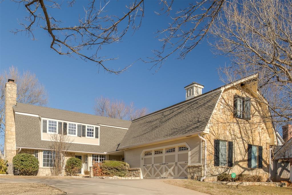 Welcome to this beautiful five-bedroom, three-and-a-half-bath home, perfectly situated on a charming cul-de-sac in the highly sought after Quail Creek neighborhood.The layout offers incredible flexibility with two primary bedroom options—one downstairs that could also serve as a den or playroom, and an upstairs suite featuring a large walk-in closet with designer wallpaper. Two bedrooms include cozy fireplaces, with a third fireplace in the living adding warmth and charm to the home. The fully remodeled kitchen opens to the living and dining areas, creating a bright and inviting space for family gatherings. Both the living room and dining room feature charming window seats, perfect for relaxing. Wood flooring throughout provides a classic clean look that's stylish and easy to maintain.Step outside to a welcoming stacked-stone exterior and a large front porch, ideal for gathering with friends. The backyard offers multiple grassy areas, a patio space perfect for al fresco dining, and is lined with sycamore and peach trees—creating a serene, private retreat. Additional highlights include a new roof (fall 2025) and new siding and paint (January 2026).Quail Creek offers wide tree-lined streets, and a strong sense of community, all just minutes away from shopping, Lake Hefner, and easy highway access.