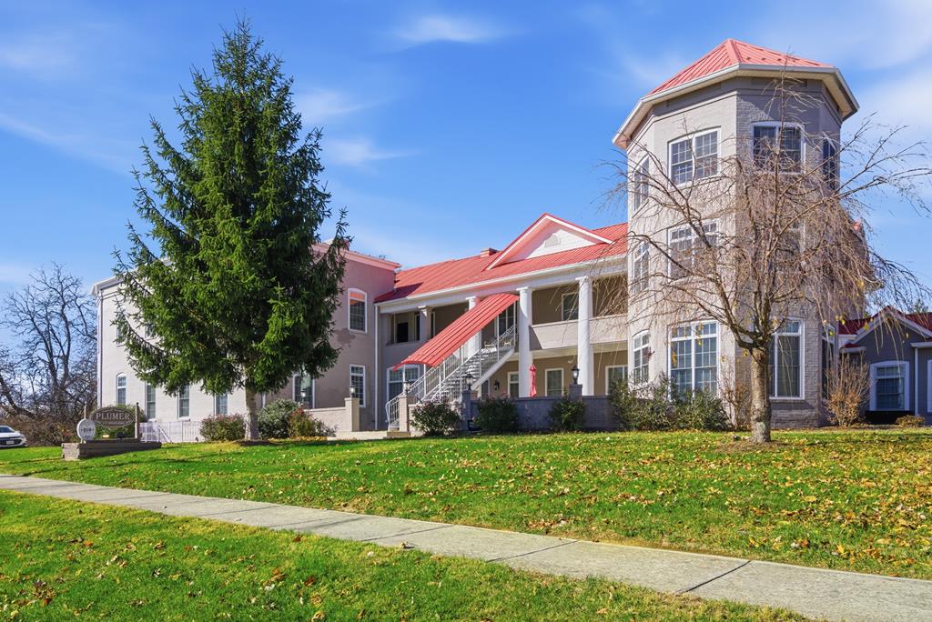 Beautiful 2-bedroom, 1-bath condo just a short walk from historic downtown Wytheville, VA. This landmark building—formerly Plumer College—was transformed into thirteen modern, uniquely designed condo units. This unit features an inviting open floor plan with hardwood floors, stainless steel appliances, granite countertops, and convenient washer/dryer hookups. Enjoy a spacious private balcony perfect for relaxing, entertaining, or taking in the charming neighborhood surroundings. Each unit is individually metered for electric, water, and sewer. Condo fees include snow removal, building maintenance, exterior lighting, trash pickup, and lawn care.