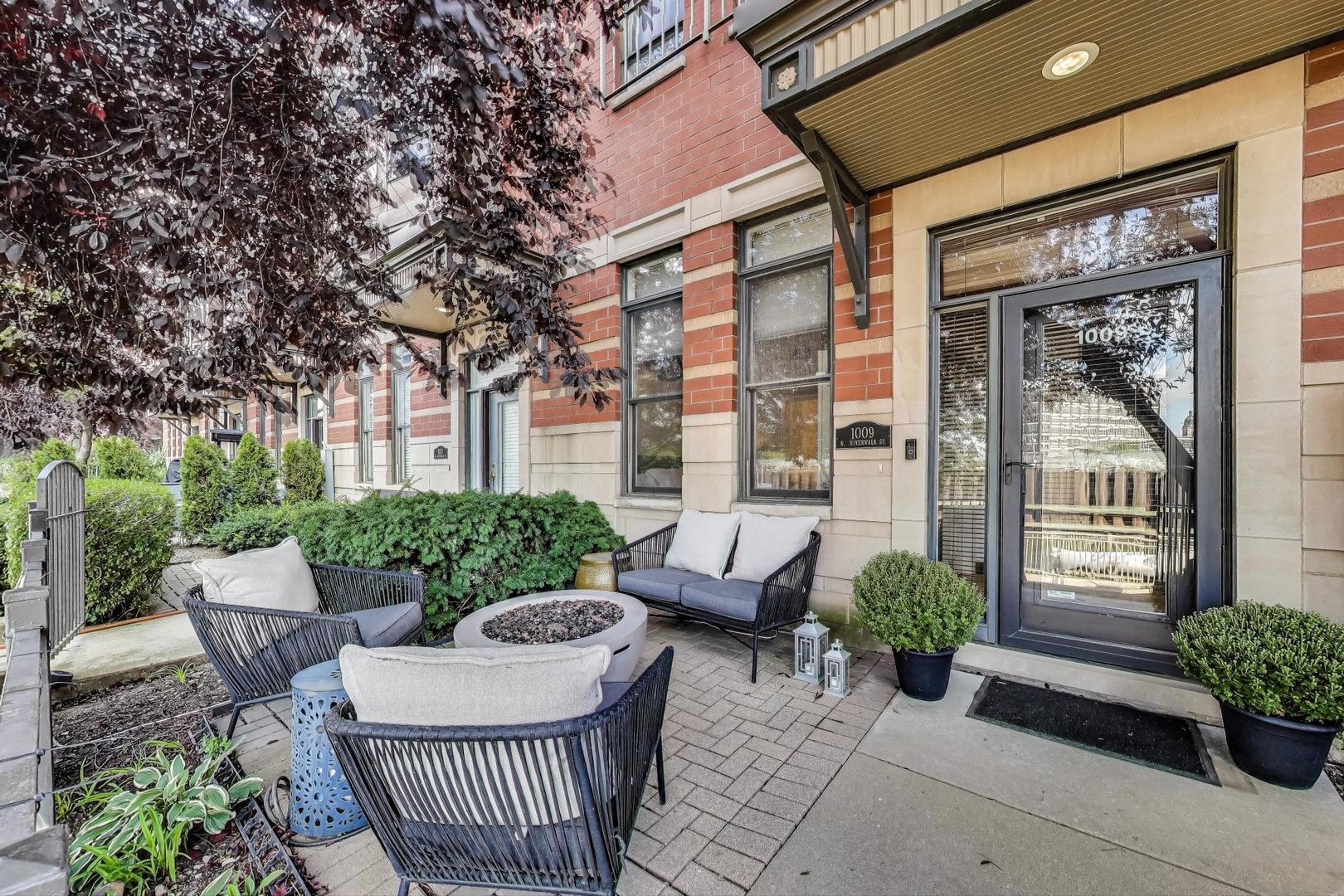 WATERFRONT LIVING AT ITS FINEST. RARELY AVAILABLE 3 BEDROOM 3 BATHROOM TOWNHOME LOCATED ON THE NORTH BRANCH OF THE CHICAGO RIVER. CUSTOM UPGRADES, DESIGNER LIGHT FIXTURES & WINDOW TREATMENTS. TRAVERTINE & GRANITE FOYER OPENS UP TO A FIRST FLOOR BEDROOM OR OFFICE ENSUITE. MAIN LEVEL FEATURES OPEN KITCHEN W/GRANITE, SS, DOUBLE OVEN, MAPLE CABS, ISLAND, BREAKFAST BAR & A BALCONY W/ GRILL AND AMAZING VIEWS. LARGE DINING/LIVING ROOM W/ CUSTOM SHELVES, SLATE GAS FIREPLACE & 85" TV. FULL W/D. SECOND LEVEL INCLUDES LARGE PRIMARY BEDROOM ENSUITE AND THIRD BEDROOM WITH A FULL GUEST BATHROOM. ROOFTOP DECK W/ GREAT EAST/WEST VIEWS!  ENJOY EVERYTHING THE RIVERWALK HAS TO OFFER INCLUDING BOAT SLIPS, PARKS AND RESTAURANTS YET STILL BE TUCKED AWAY IN A TRANQUIL OASIS. ATTACHED 2 CAR GARAGE. NEWLY PAVED DRIVEWAYS. FULLY GATED COMMUNITY WITH PRIVATE PARK. EASY ACCESS TO RED/BLUE/PURPLE/GREEN LINES, METRA, 90/94/290/55 INTERSTATES. MINUTES FROM GOLD COAST/OLD TOWN/LINCOLN PARK/LOOP, MICHIGAN AVE SHOPPING/DINING, EAST BANK CLUB/BIAN. TRULY A SPECIAL PROPERTY.