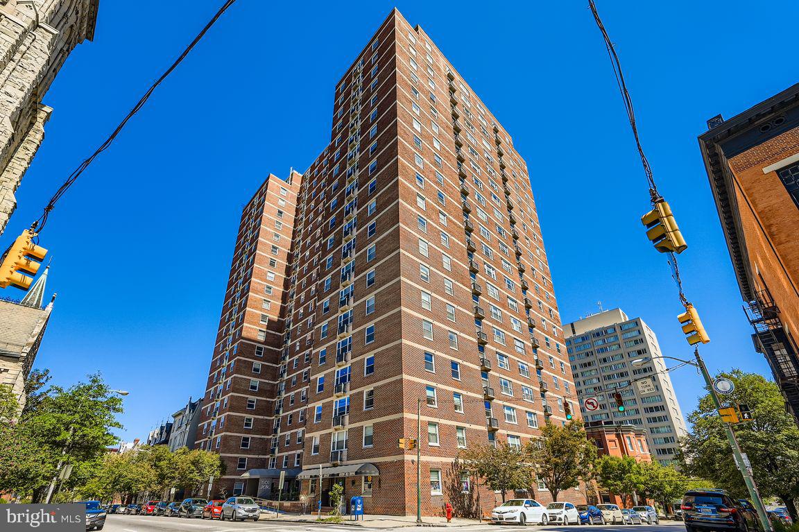 Corner unit 1410 offers panoramic views from three sides,  See all the way to outer harbor on one side and all the way to Towson on the other.  Fabulous city skyline views.   Beautifully renovated kitchen, undercabinet lighting, modern baths and solid oak 3/4 inch hardwood flooring throughout the unit.  NO CARPET.   Replacement windows and upgraded heating and air conditioning.  This unit needs nothing but a new owner.   One of the best locations on the NE corner of the building gets morning AND afternoon light.   Full-service, secure, elevator building has a twenty-four hour front desk to greet guests and collect packages, on on-site management office and resident manager.  A deli/convenience store is also accessible from inside.   Three blocks from Penn Station.  Underground parking available in the building for an additional fee.  Located in the historic Arts and Cultural Mid-Town District, close to all the cultural attractions such as the Meyerhoff, the Walters Art Museum,  The Lyric Opera House as well as University of Baltimore and Peabody Institute, all centered around Mount Vernon Place's parks that ordinally flank the Washington Monument.  Convenient to downtown and major arteries and all forms of public transportation.  A wonderful apartment in a desireable building in a great neighborhood.  Schedule to see this unit.  You won't want to miss it.