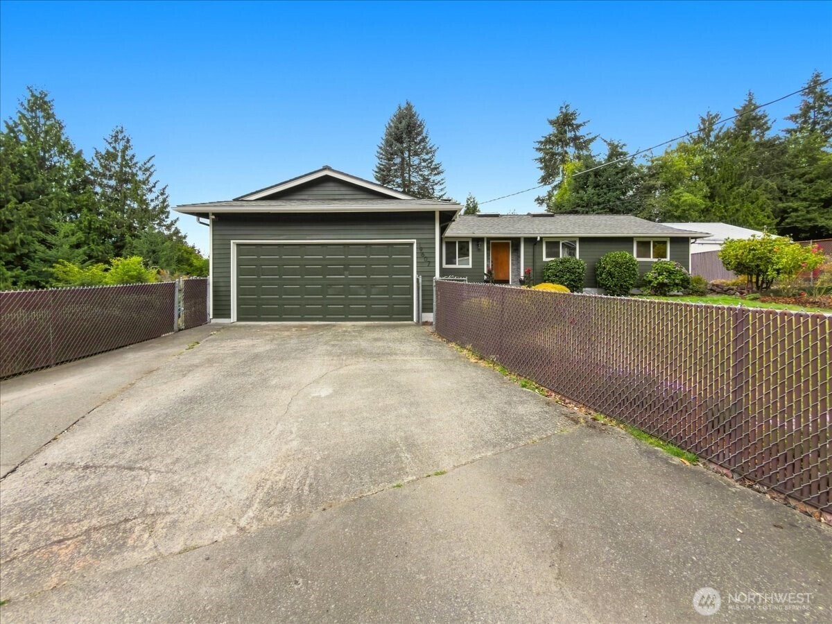 Discover a rare Fairwood opportunity! Here is your chance to own an updated home with land connected to sewer! This beautifully maintained home is over .5 acre and zoned R-6, offering exceptional flexibility for future possibilities. The expansive lot provides potential for subdivision or space to build a second home or DADU with the possibility of adding 2 additional homes on site (buyer to verify).  Nestled in a quiet dead end street with no HOA, this property blends space, privacy, and comfort in one of the area’s most sought-after neighborhoods.    Once inside, you're met with an updated kitchen featuring modern finishes that flows into two bright welcoming living spaces, where friends can gather and relaxed. Down the hall three generously sized bedrooms include a serene primary suite with its own private bath. With three updated bathrooms, there is one for everybody!     Step outside to a fully fenced backyard with mature landscaping that feels like your own private park! Perfect for gatherings, gardening, or simply relaxing in your own private retreat. Don't miss the attached shop with its a separate entrance, tall crawlspace for extra storage, RV hookup, 5-person hot tub, above ground pool, treehouse and ample parking for all your vehicles and toys. With top-rated schools, convenient access to parks, shopping, and commuter routes, and the added value of R-6 zoning on a large lot, this home offers both comfort today and potential tomorrow.    Assumable VA Loan Available