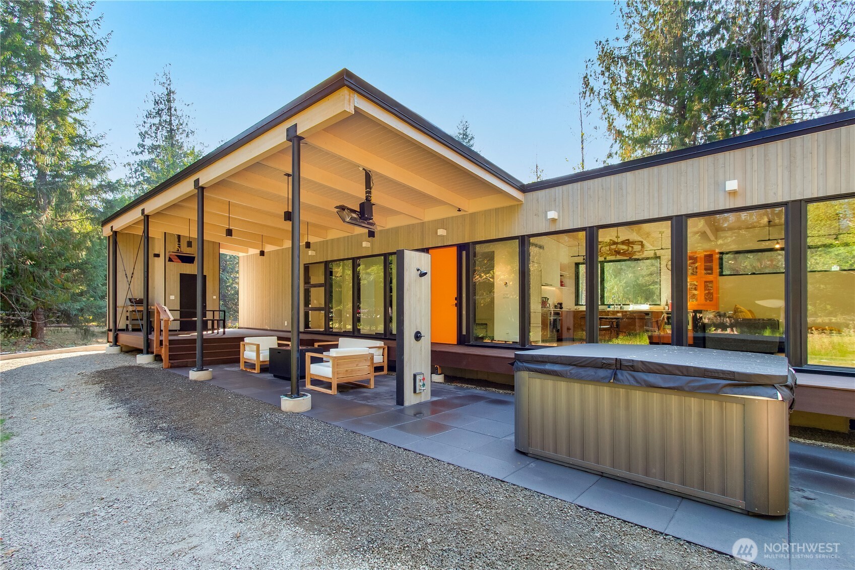 Northwest Modern Cabins Near White Pass–Income Potential & Mountain Views! Discover two high-end modern cabins on a private setting w creek access, lush surroundings & mountain views. Each fully furnished cabin features 2 beds, 2 baths, beamed ceilings, panoramic windows, heated floors, gas fireplaces, gourmet stovetops, high-end appliances, hot tubs, outdoor showers, outdoor heaters, covered decks/patios, firepit, grill, ample parking & EV chargers. Turnkey and ideal for full-time living, vacation use, or STR income—gross rents for the last 12 months were $170K. Keep one & rent the other or buy with friends for a shared getaway. Minutes to Packwood, White Pass Ski Area, Mt. Rainier, rivers, hiking & year-round recreation. Seize this gem!