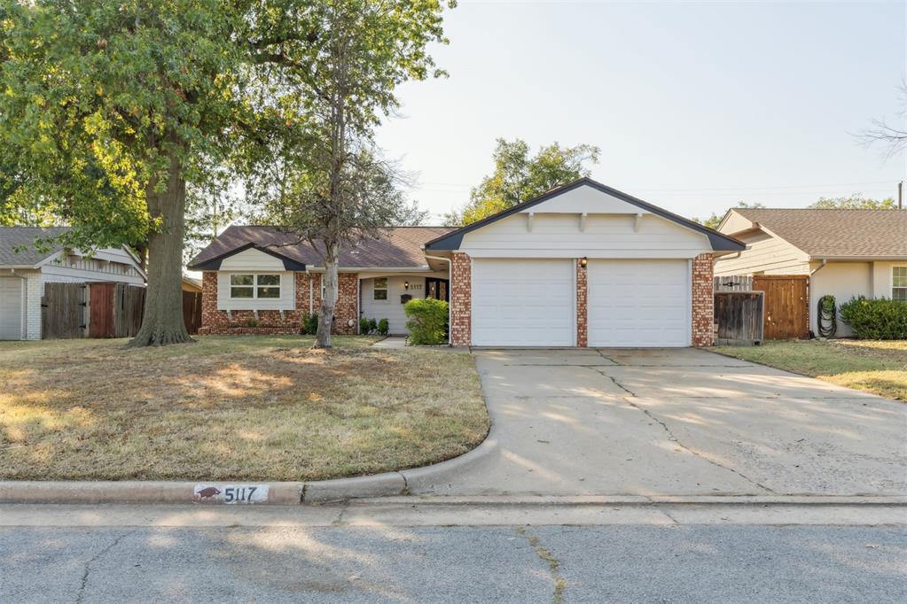 Welcome to your dream home in the friendly Warren’s Springdale neighborhood! This cozy 3 bed, 2 bath home is ready for you to make it your own. Step inside to find a spacious living area, complete with a ceiling fan and a built-in electric fireplace that adds a warm touch (plus, it changes colors!). The kitchen and dining space are perfect for gatherings, featuring painted cabinets, sleek quartz countertops, and a deep sink with modern fixtures and don't miss the added wine fridge. You’ll love cooking on the stainless steel gas stove, and the recessed lighting gives everything a bright and airy feel. The master bedroom is complete with an en suite bathroom, featuring an updated shower, stylish quartz countertops, and updated cabinetry. 2 additional  bedrooms and the updated main bathroom provide a comfortable space for family or guests.  Outside, you’ll find a wood-fenced backyard that’s perfect for barbecues or just enjoying the shade from the mature trees. There’s also a covered patio for those sunny days. Plus, the  two-car garage has been decked out with dream man cave floors, perfect for your home gym, tinkering in the garage or just make you car feel pampered. This home is conveniently located near schools and shopping, with easy access to I-44 just half a mile away. Don’t miss out on this opportunity—come see it for yourself!
