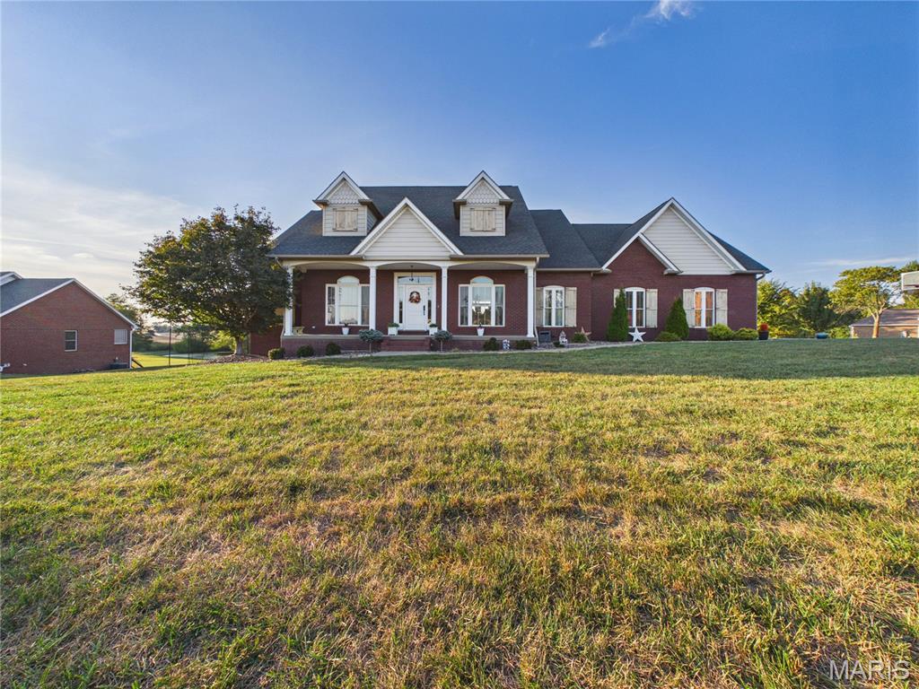 Welcome to 220 Coyote Ridge in the sought after Saddlebrooke Ridge subdivision. This beautifully updated home offers the perfect combination of space, privacy, and entertainment. Located just minutes from Jackson, this gorgeous home offers 5 bedrooms, 3.5 bathrooms, an outdoor batting cage, in-ground salt water pool, and so much more. The sunsets are breathtaking, over looking a stocked 4 acre private pond. Entertaining is a breeze with your pool, covered decks, and movie theatre inside., and finished bunk room with two built in bunk beds! The 3 car garage is large enough for your vehicles and toys, with even more storage above the garage. In the kitchen you will find all new stainless appliances, granite countertops, and a convenient open floor plan. Escape to your spa like primary suite to treat yourselves after a long day. Even more peace of mind, with a new roof (2020) with a 50 year warranty, and brand new HVAC system (2026) Look no further than 220 Coyote Ridge! Don't miss your opportunity to own this luxurious home!