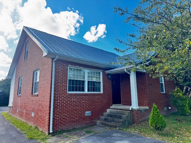Charming 3br/2bath cottage close to the heart of town. Located just a stone's throw from the world -famous Jack Daniel's Distillery, this well-maintained home offers the perfect blend of small-town charm and modern convenience. Located in the heart of historic Lynchburg this inviting property features a newer metal roof, kitchen with separate dining area and a spacious living room with a fireplace. Whether you are looking for a weekend retreat, a full-time residence, or an unique investment opportunity, this home puts you close to local shops and restaurants.