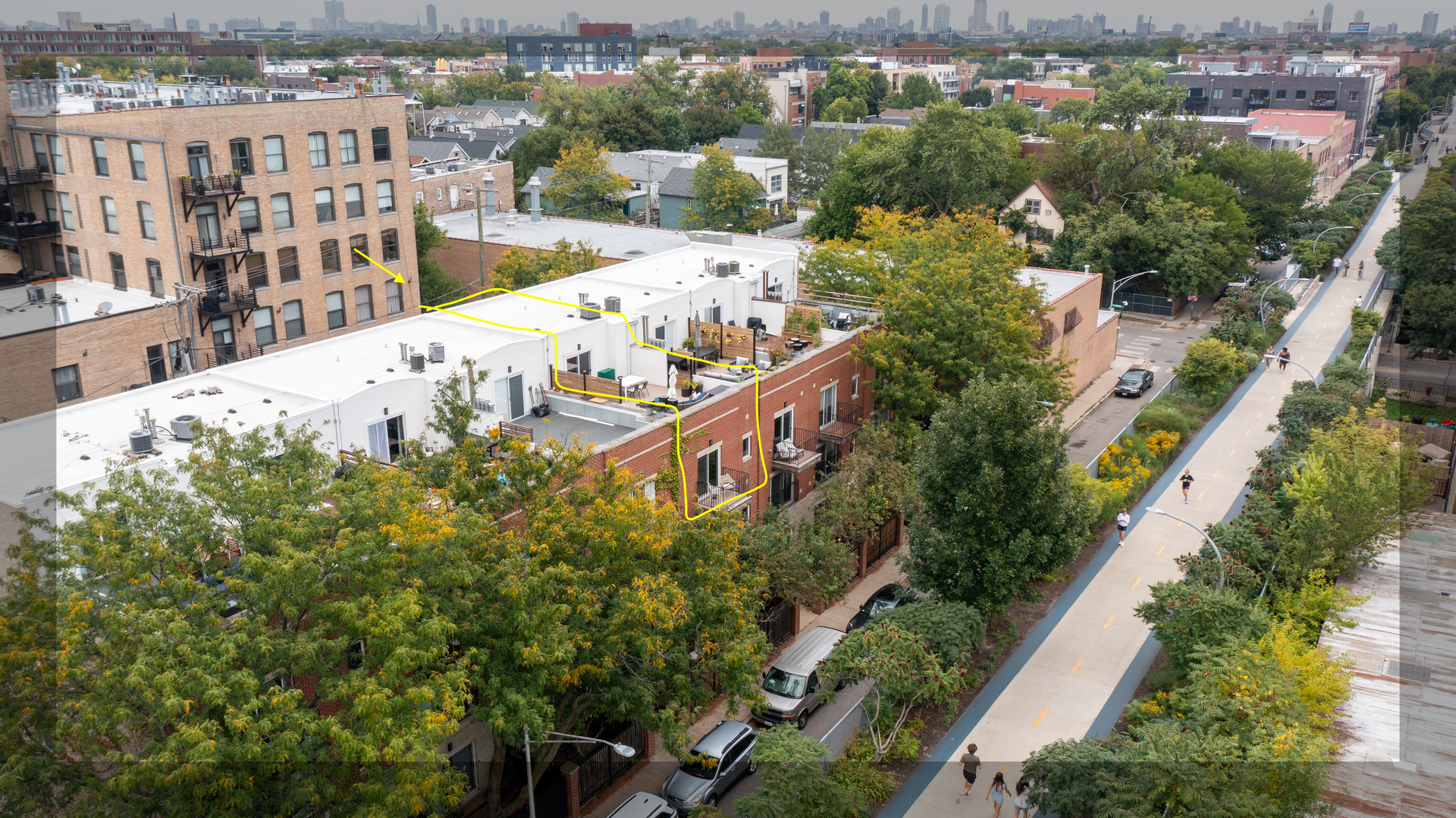 OFER DEADLINE SEPTEMBER 29 10 AM PLEASE.Welcome to Bloomingdale Trail! This is West Bucktown and Logan Square. The 606 is across the street. Just a couple blocks from Wolf & Company-(The only restaurant and retail accessible directly from the 606). Quietly tucked away on a one way street and around the corner from any eatery, shopping, and entertainment your heart may desire. This super cozy penthouse is two quick flights up from the sidewalk. Radiating coastal beach vibes, the first floor offers a spacious living room with a gas fireplace and an attached street front balcony. Open to the living room is a tastefully appointed new kitchen that was expanded from its original design. All white cabinets and black matte hardware, upper cabinetry that runs seamlessly to the ceiling, quartz counters, vertical subway tile backsplash, farm sink, stainless steel appliances, and stylish lighting. Hardwood floors, an elegant dry bar with a built in cabinet and pull out drawers, sophisticated and stylish full bath on the main floor, laundry closet, mudroom-nook at the back entry and second bedroom. Take the stairs up to the master suite and find an oversized bedroom with wall to wall built in wardrobes, a separate attached walk in closet and an ensuite bathroom with all white appointments. Tastefully simple finishes that appeal to the most particular personality. Step out from the master suite to a fabulous all new roof top deck overlooking the 606 and take in peaks of the Chicago skyline. All new premium composite decking on rooftop and balcony, all new premium sliding doors and windows(2023), new custom window casements throughout and custom trim, custom closet interiors, new water heater(2024), new furnace(2024), new kitchen appliances(2020), new washer and dryer( 2022 with 5 year insurance coverage), new gas fireplace(2020). Gated parking included in the price! DOGS and CATS allowed! Rentals allowed with a cap 0f 4 at a time- 3 are currently rented. Recent HOA improvements: New common area paint carpet and lighting, New top floor stucco( lower floors are masonry), New butterfly MX keyless entry.