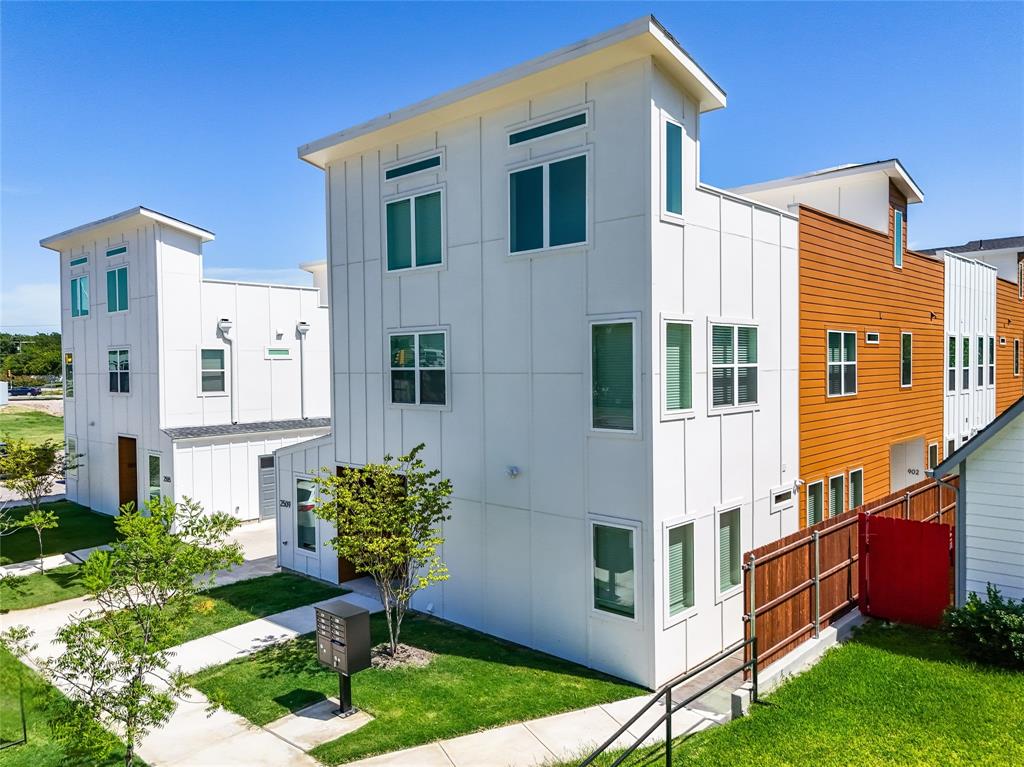 Unit 902 offers three bedrooms, three bathrooms, a spacious three-car garage, and a private rooftop terrace ideal for relaxing or entertaining. The home features thoughtfully selected finishes throughout, including luxury vinyl plank flooring, quartz countertops, shaker-style cabinetry, and stainless steel appliances for a modern, refined look.The first floor includes one bedroom and full bathroom, along with a full-size washer and dryer. The second level features an open-concept kitchen and living area, plus two additional bedrooms and bathrooms. The third floor opens to your private rooftop deck, providing the perfect space to enjoy views or host friends and family.