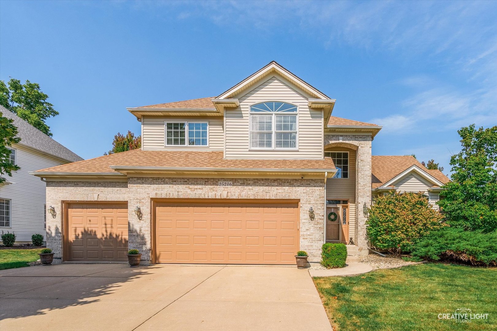 Step into this stunning 4BR, 2.5BA home in Walkers Grove and instantly feel at home. A grand 2-story foyer welcomes you, flanked by formal living and dining rooms with soaring cathedral ceilings. Continue into the spacious family room with a cozy fireplace and rich cherry hardwood floors that flow seamlessly into the gourmet kitchen-complete with granite counters and 42" maple cabinets. The sunroom offers the perfect spot to relax with backyard views. Upstairs, the luxurious primary suite features its own fireplace, spa-like Jacuzzi bath, and walk-in closet. A 1st-floor office/den, full unfinished basement, and 3-car garage add function and flexibility. Enjoy outdoor living with a brick paver patio and newly fenced yard. New roof and fence in 2024! Tucked away on a quiet cul-de-sac in highly desirable North Plainfield.
