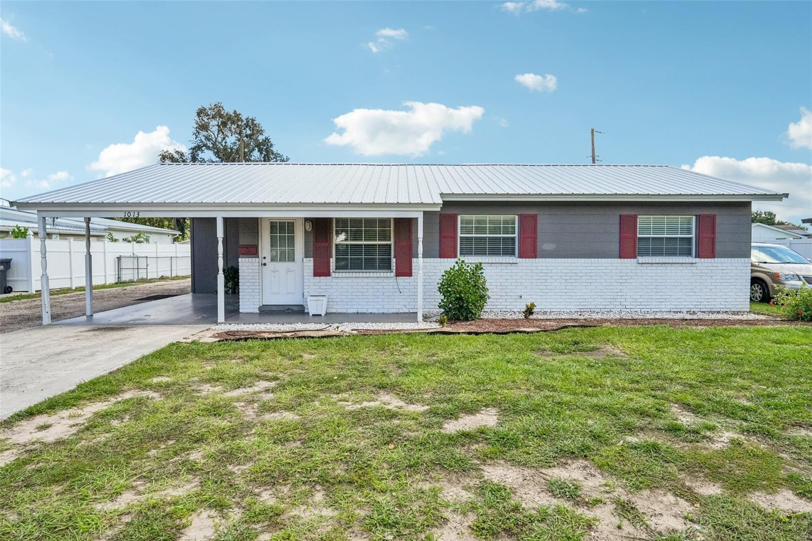 Built on a solid foundation with major capital upgrades already completed, this 3-bedroom, 1-bathroom home offers incredible core strength and long-term value with no HOA restrictions. The interior is currently configured and utilized as an office space, but it can be easily converted back to a single-family home to fit your needs. Major improvements have already been taken care of, including a new metal roof installed in 2024, energy-efficient double-pane windows, and a direct connection to public water and sewer with the old septic tank fully removed. Mechanical, electrical, and plumbing systems are all in good working order, giving you complete peace of mind on the major components. Inside, you will also find a dedicated indoor laundry and utility room. The kitchen area currently lacks a full range and select cabinetry, presenting a straightforward cosmetic project to design the exact kitchen space you want. Outside, the property features a spacious, fully fenced yard with a storage shed, a single-car carport, and ample room for rear vehicle parking. Dual curb cuts provide convenient access with the potential to add a circular driveway. Located along Parsons Ave, this property is ideal for an owner-occupant looking to customize, a landlord seeking a rental with solid bones, or a long-term investor. Contact us today to schedule your private tour.