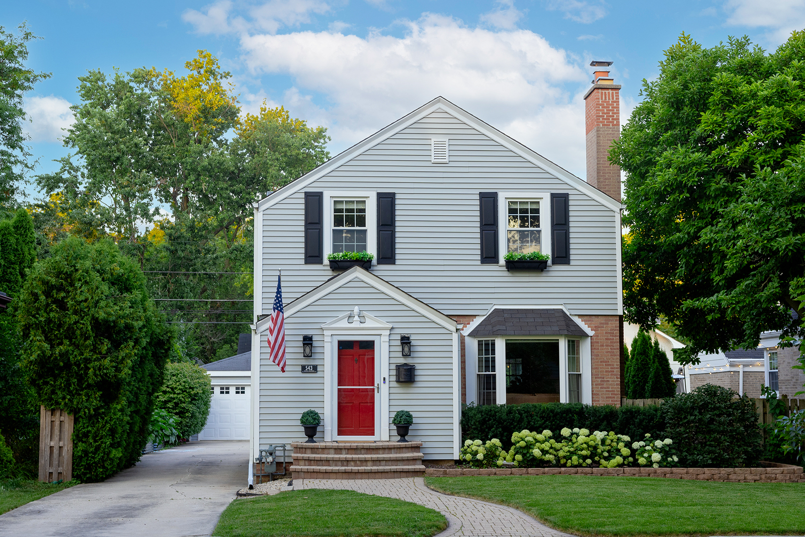 This Arlington Heights gem is ready for new owners with a NEW ROOF in October 2026! Ideally located just a half-mile from vibrant downtown Arlington Heights and less than a mile from the Metra, this home offers the perfect combination of style, convenience, and functionality. With tasteful finishes, a sought-after location, and the rare find of a three-car garage, this home truly stands out. Step inside to a charming living room featuring hardwood floors, a bay window overlooking the front yard, and a cozy fireplace that creates a warm and inviting atmosphere year-round. The spacious dining room is perfect for everyday meals as well as entertaining family and friends. The updated kitchen showcases quality cabinetry, newer quartz countertops, and a classic subway tile backsplash, blending timeless style with everyday practicality. Just off the dining room, the sunroom seamlessly connects the indoors with the outdoors and features newer flooring. Upstairs, you'll find three comfortable bedrooms and a full bath. The finished basement offers flexible living space ideal for a family room, home office, workout area, or playroom, along with plenty of additional storage. Step outside to the patio and fenced backyard-an inviting space for relaxing, entertaining, or enjoying the outdoors.