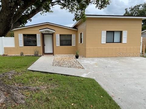 Stunning house centrally located in mid Pinellas County.   not in the flood zone but close to beaches, shopping, restaurants and major roads.  Its feature includes 3 bedrooms, 2 bathrooms, split floor Plan, large fenced back yard with shed.  New vinyl luxury plank flooring and new baseboard throughout. new kitchen counter-tops and new range. Newer AC and roof were replaced in 2019, the shed installed in 2024.  Original cast iron sewer pipe under slab between bathrooms and kitchen replaced with Schedule 40 PVC pipe. Freshly painted inside. double concrete driveway and sidewalk. No HOA, no rental restrictions.