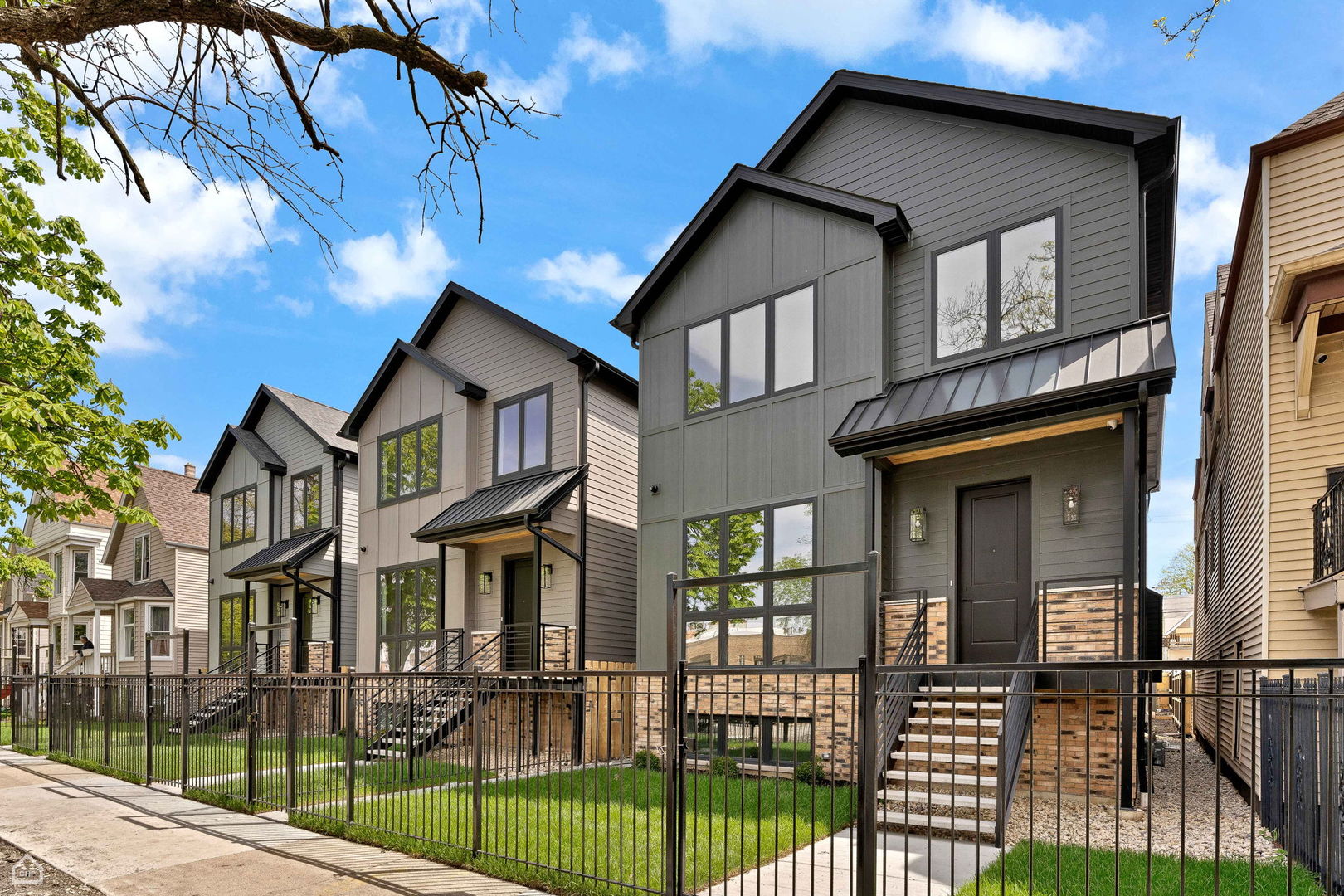 Impeccable New Construction in Prime Irving Park Location.   This New Extra Wide home lives Grand across 3 Expansive Levels.   First floor mixes formal and casual spaces flowing to Entertainers kitchen with Thermador 42" Pro Refrigerator and 36" Range, Massive waterfall island and Butlers Pantry with Wine Cooler.  Seperate built out Pantry Room.   Family room adjacent the Kitchen with Fireplace.   2nd Floor features a Coveted 4 BEDROOMS UP layout, including stately Primary with Luxury Bath, 2nd Floor Laundry and Great closet space - All closets are custom built out in this home.   The Finshed basement includes a Rec room w/wet bar, 5th Bed, and additional Flex Room:  Office/Gym/Den and great Storage.  High End Finishes thoughout the home including 10ft 1st Floor, Black on Black Windows, Hard Wired Exterior Camera System, White Oak Hardwood throughout, Extensive Trim Package with Accent walls, Beams, Modern Fireplaces, Custom Mud Room with Bench. Fresh Dark Gray Hardie and Chicago Common Brick exterior with custom metal stairs.   Outdoor Space is expansive including great backyard space with Metal/Wood Fence, Paver Patio and landscape package.   2 Car Garage with Finished Roof Deck and Party Door.    Great Neighborhood location close to everything - Schools, Restaurants, Independence Park,  Downtown, Metra and Blueline.  Great value for New Construction of ths size.