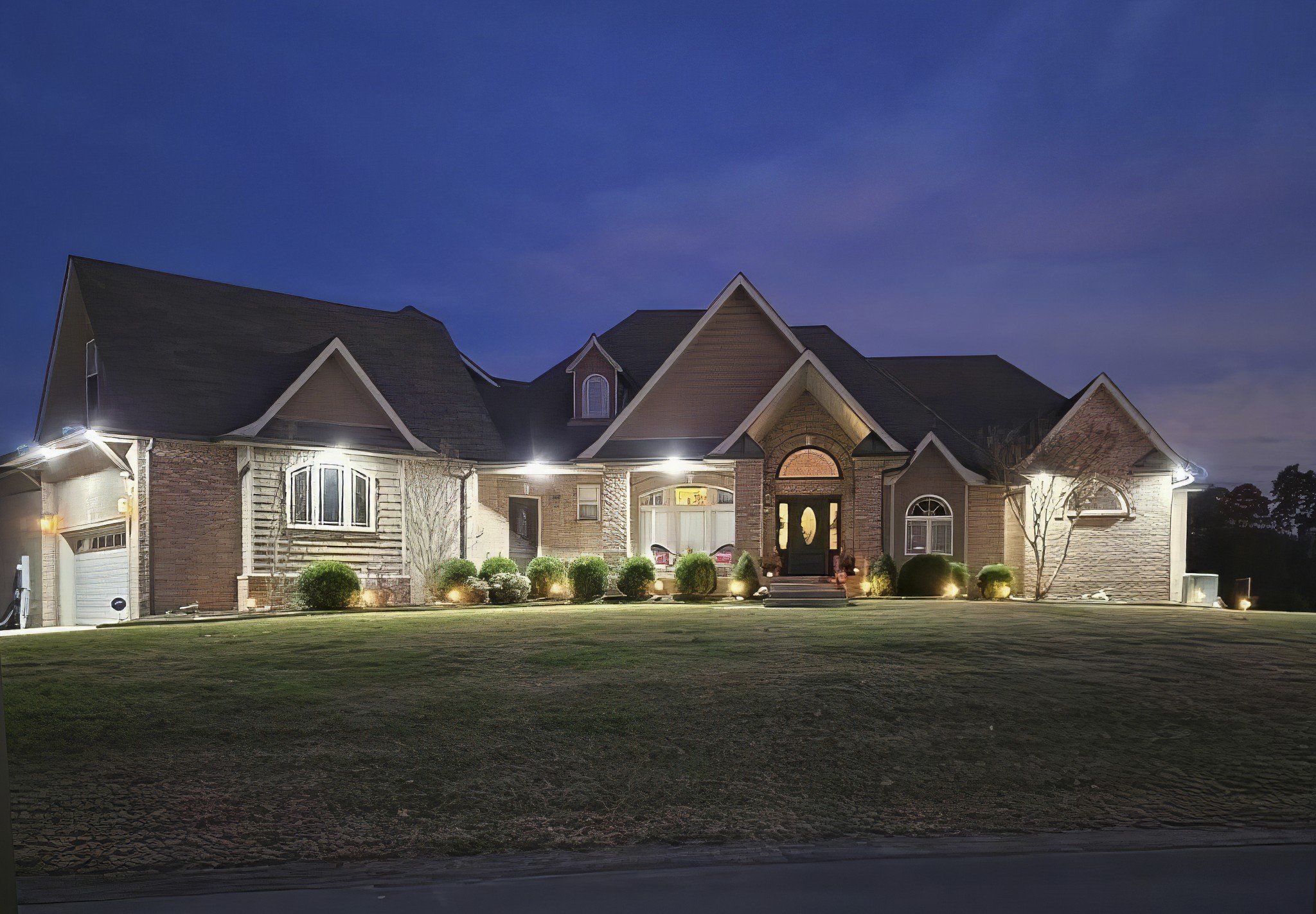 Welcome Home to an extraordinary luxury estate designed for sophisticated living and effortless entertaining / All Brick and it's Perfectly Nestled on 1.6 Acres with A Wooded Treelined Backyard / This magnificent home features 3 spacious main-level bedrooms and 1 bedroom and a library on the 2nd level (722 sq.ft.) ... Your College Student or young adult Will Love the Spaciousness and Privacy on the 2nd level / Work from Home? Perfect! There is a dedicated Office Off the Entry / You’re going to love the user-friendly flow of this floor plan / This home offers an ideal plan for Comfort, Fun, and Privacy. / This is A Split Bedroom Design Offering A TON of Privacy / Your main level whispers to both the young and the gracefully aging, boasting over 3000 square feet / Enjoy and watch your dream come ALIVE Downstairs: The sprawling, fully finished lower level serves as an ultimate entertainment sanctuary, complete with A dedicated sound-controlled family theater room, bar, several multi-purpose rooms, your award-winning home gym (just bring your personal trainer) / The Entire House was professionally finished by the original builder / Per the builder, the storm room in the basement is a "level 5" or EF 5 (designed to meet strict FEMA's standards to protect against catastrophic wind (exceeding 200 mph) and flying debris / 2 Car Garage on Main Level & A 1 Car Garage on Basement Level / One of the sellers' favorite benefits of this property is being centrally located to Nashville, TN and Ft. Campbell, KY ... Could NOT wait to drive home after a busy day at work ... Relaxing and enjoying A Refreshing Oasis-Like Atmosphere that offers immediate relief from the hustle and bustle of everyday life ... Sometimes, just sitting on the deck overlooking their lush natural green park-like backyard and enjoying a deep sense of privacy and unconditional serenity. Welcome Home! You Are Gonna Love It!