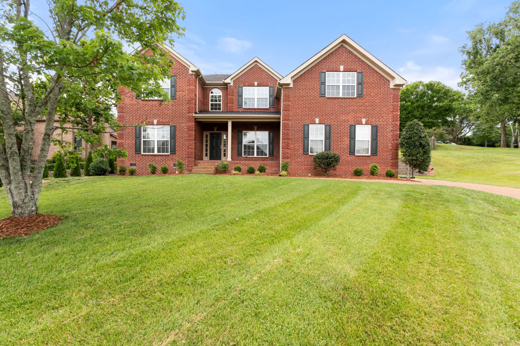 UNDER CONTRACT BUT  STILL ACCEPTING OFFERS.  Appraisal  (8/14/25) for $1,200,000 by request.  INCREDIBLE home, LOCATION and TOP-RATED schools.  NEWLY painted interior including closets, NEW carpet in the 4 large bedrooms and 20'x14' bonus room.  Extensive HARDWOODS on main except primary bedroom has new carpet, HARDWOOD stairs, HARDWOOD 2nd floor halls to bedrooms and HARDWOOD 18'x12' 2nd floor LOFT/OFFICE.  Spacious PRIMARY BEDROOM on main floor is 27'x15' and has adjoining OFFICE.  PRIMARY bathroom has spa tub, separate shower, 2 vanities, door for toilet and 14'x9' closet. 2ND PRIMARY BEDROOM UP has spa tub, double vanities and walk-in closet.  The 3 FULL baths, 2 GUEST baths and UTILITY ROOM have tile floors.  Former model with arched dining room doorways, trey ceiling and beautiful millwork thru-out.  2 story foyer (16'x6'), 2 story Great Room (19'x19') with 5 windows of light and fireplace is open to the kitchen.  The 20'x15' eat-in KITCHEN has granite counters, double oven, 22 cabinets, corner rotating cabinet, 8 drawers, pantry, island, 7 recessed lights, etc.  This home is one of 2 homes in the cul-de-sac.  The rest of the cul-de-sac is common area (mowed) and trees that no one else seems to use as it is at the back of Jackson Lake subdivision.  Half a block away (past the gazebo) is the walking trail, playground, fire pit and fishing dock.  Jackson Lake is for enjoying nature by foot or kayaks, canoes, paddle boats (non-motorized).  Enjoy the 18'x5' front porch (newly painted shutters and front door), or the 32'x17' back patio.  The home backs to one neighbor and has a gorgeous wall for privacy and landscaping.
