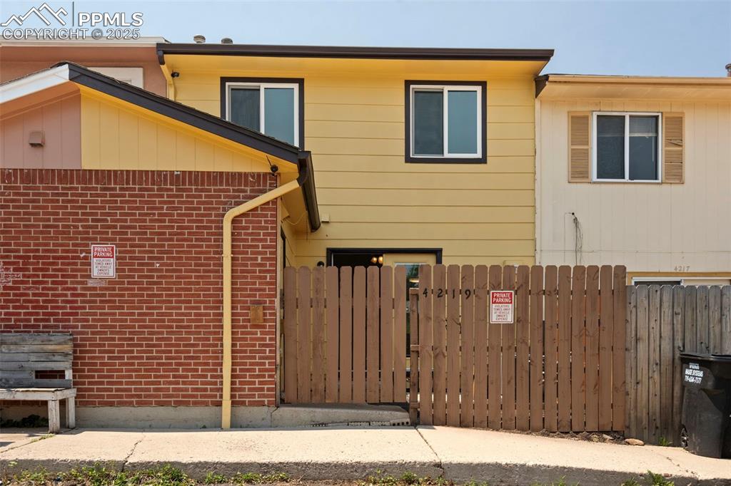WELCOME HOME to this beautifully remodeled townhome in the Trues Mills neighborhood centrally located in Colorado Springs! This charming 2-story gem offers 3 spacious bedrooms, 2 bathrooms, 2 available parking spots, tons of additional storage throughout, a fully fenced in front and backyard with a storage shed and NO HOA!!! The tastefully updated galley style kitchen features a full suite of stainless steel appliances, and has plenty of cabinet storage space! The primary bedroom features not one, but TWO closets; one of which is a walk-in! This lovely property also features a bonus flex room that is sound proof, that can be used as a studio or for additional storage! Recent upgrades include upgraded master electrical panel, roof, interior and exterior paint, LVP flooring throughout the main level, kitchen cabinets, countertops, backsplash, cedar fencing, sun bleached wood wainstotting, built-ins, additional insulation in the attic, circuit for 220V NEEMA 14-50 plug for fast-charging of electrical vehicles, a brand new stainless steel stove and refrigerator, and much much more! This home backs to Trues Mill Park, and is close to Valley Hi Golf Course, 10-15 minutes to UCCS, the airport, downtown Colorado Springs, the Broadmoor & Cheyenne Mountain Zoo, and close to Memorial Hospital & Memorial Park. This home has been well maintained and is move-in ready!  Schedule your private showing today, you will not want to miss out on this opportunity!