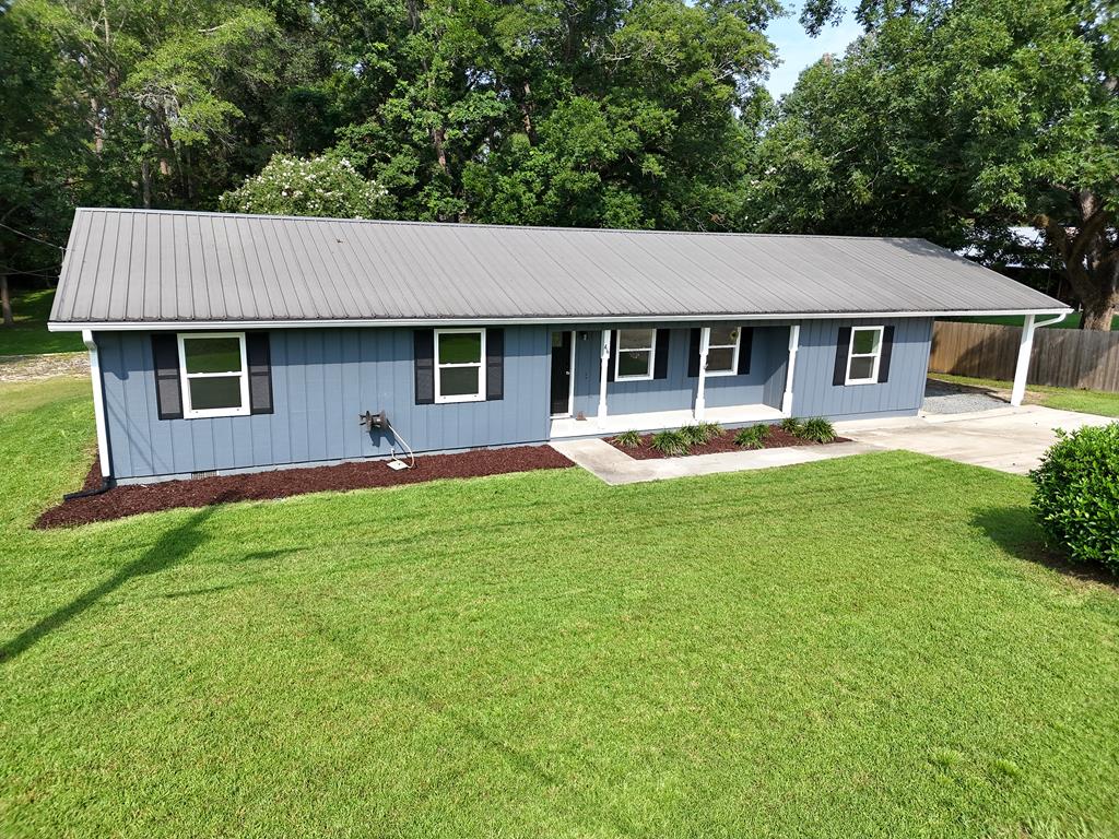 Take a look at this beautifully remodeled home in Thomasville, Ga! This wonderful 4BR/2 Bath home features great open living space, stunning floors throughout, a great layout and more. There is a big living room with nice windows for plenty of natural light. The kitchen is amazing with attractive countertops and cabinetry, and there is also a convenient laundry and utility room with new shelving. The previous carport has been close in for a huge multi-purpose room or 4th bedroom, and there are 3 nice bedrooms on the opposite end of the house. All this on a huge piece of property with sprawling backyard, carport, outbuilding, back patio and MORE! Call your favorite agent TODAY for a closer look! Click here for virtual tour: https://my.matterport.com/show/?m=FMikcEJ7KWU&mls=1