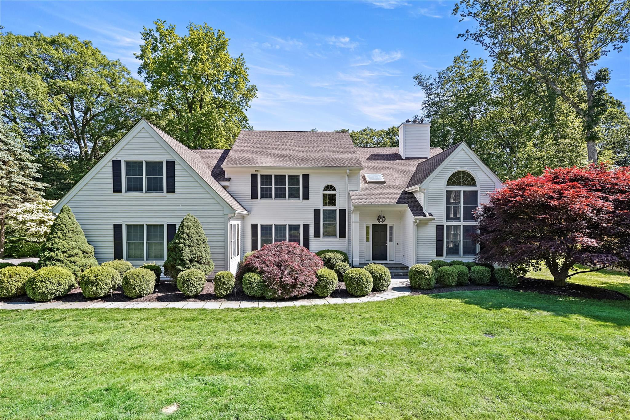Located in the heart of bucolic Bedford, Mianus Bluff Drive is a quiet cul-de-sac, just seconds to town. This impressive five bedroom, five-bathroom home on 2.5 acres was extensively renovated in 2021. Professional design and meticulous attention to detail have resulted in a sophisticated, elegant, comfortable and functional home, perfect for today's lifestyle. A spectacular two story entry, multiple living spaces, dining room, powder room, eat-in-kitchen, and first floor bedroom with full bath are featured on the main level. Follow the elegant staircase to the right and find a private, primary suite with fireplace, walk-in closet and spa like bathroom. Down the hall are the three additional bedrooms, one with an en suite, a hall bath and laundry room. A finished lower level with multiple spaces and walk out is perfect for a playroom or gym. An enormous storage room is also located in the unfinished portion of the lower level. This spectacular Bedford home is one hour to NYC, minutes to hiking trails, parks, and schools.