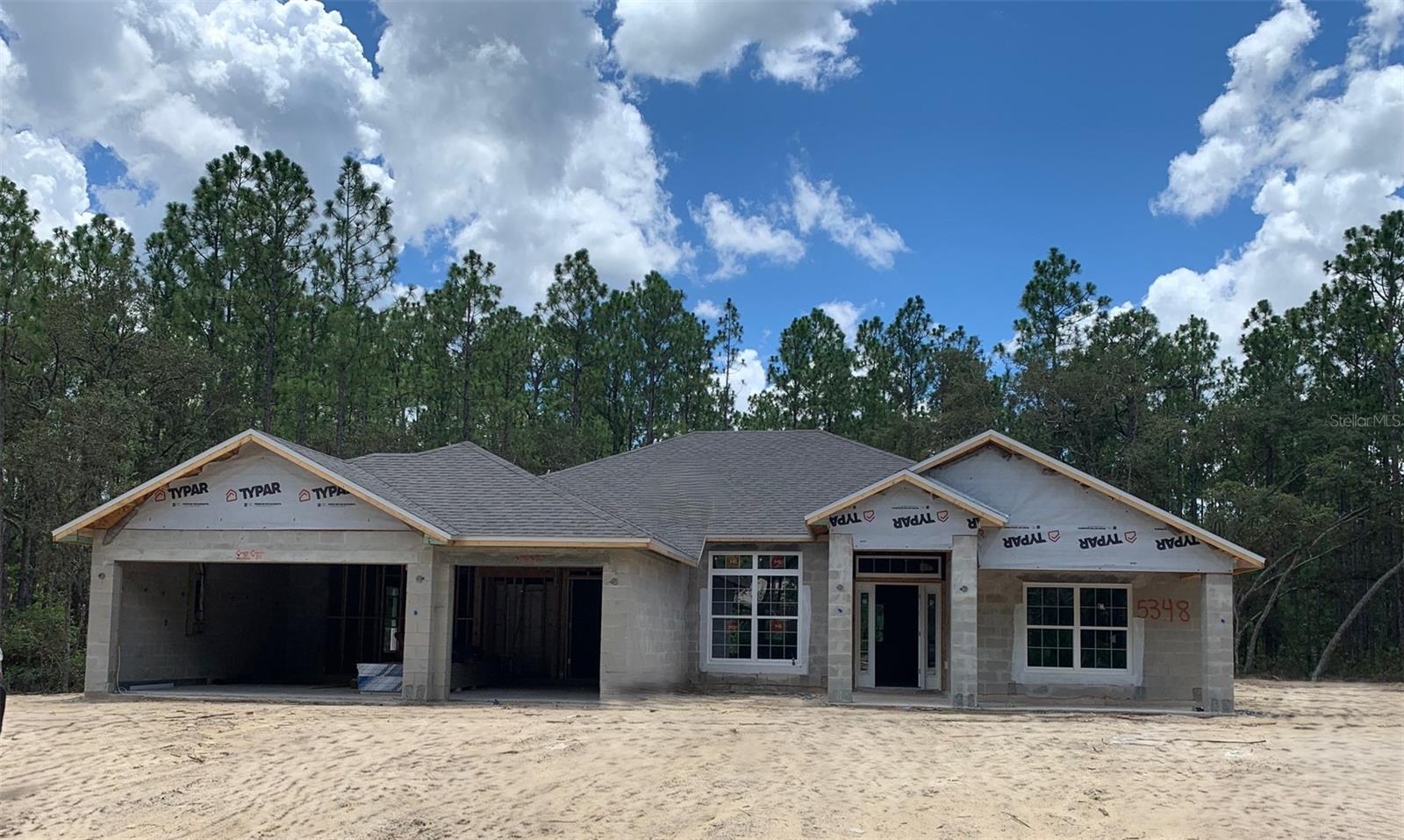 Under Construction. BRAND-NEW, QUALITY BUILT 4BED, 3BATH, 3CAR GARAGE HOME! This home is located in the sought after PINE RIDGE ESTATES, EQUESTRIAN COMMUNITY on a 1.07-acre homesite. Need a fence? You can have it! Need a shed? You can have it!! Have a horse? You can have it here!! Come join this beautiful community! Hurry in!!  This home is at 45% completion and moving right along!!  Seller pays closing costs w/approved lenders.
Upgrades included in this home: WOOD LOOK TILE EVERYWHERE EXCEPT BEDROOMS; WOOD SHAKER CABINETS; GRANITE COUNTERTOPS W/UNDERMOUNT SINKS THROUGHOUT HOME, THREE CAR GARAGE; COVERED FRONT PORCH; COVERED BACK LANAI; DOUBLE DOOR ENTRY TO FORMAL LIVING ROOM; SEPARATE TILE SHOWER W/LIGHT & SHOWER DOOR IN OWNERS BATH; TRAY CEILING W/CROWN MOLDING IN OWNERS BEDROOM; STAINLESS STEEL APPLIANCE PKG; MINI BLIND INSERTS IN BACK DOORS TO COVERED LANAI. TAEXX PEST CONTROL SYSTEM BUILT IN;  BUILDER AND THIRD-PARTY WARRANTY INCLUDED!