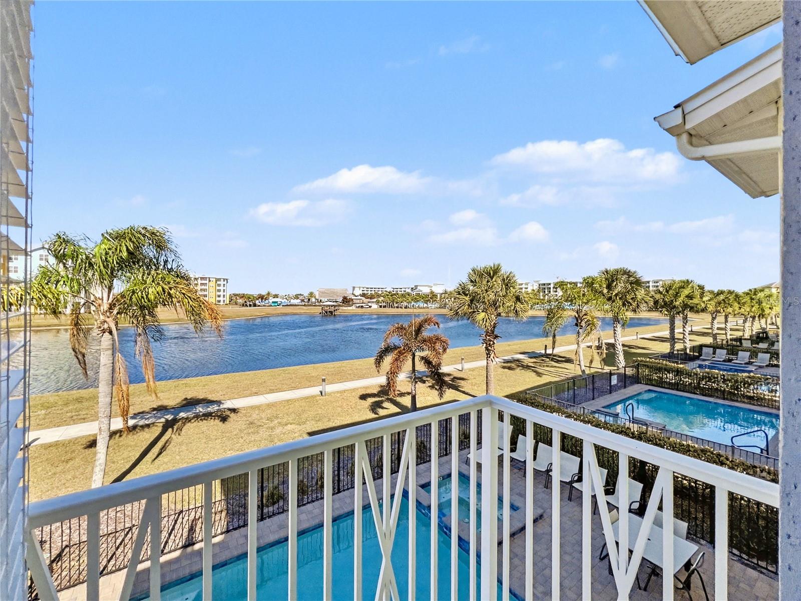 Kick back and embrace the laid-back island rhythm at this breezy lakefront retreat in Margaritaville Resort Orlando, perfectly positioned on Parrot Head Place. Wrapped in carefree Key West charm, this home delivers sun-splashed interiors, coastal hues, and a relaxed, barefoot-friendly layout that makes every day feel like vacation.Out back, your private pool and spa overlook tranquil water views, creating the ultimate setting for lazy mornings, afternoon floats, and sunset cocktails with a soundtrack of good vibes (NEW POOL HEATER FEB 2026). The open living spaces flow effortlessly for easy entertaining, while spacious bedrooms provide a calm, salt-air escape after long days of fun and sun.Perfectly located just minutes from Walt Disney World, Universal Orlando Resort, including the highly anticipated Universal Epic Universe, and SeaWorld Orlando, this home offers the best of both worlds—action-packed adventures by day and laid-back island living by night. Whether you’re chasing thrills, fireworks, or unforgettable family memories, you’ll love coming home to your own private oasis where the pace slows, the music softens, and relaxation takes center stage.Designed for both personal enjoyment and short-term rental success, this home captures the essence of island living with a splash of luxury. Just steps from resort amenities, dining, and entertainment, it’s a place where worries drift away, flip-flops are the dress code, and life moves at a perfectly unhurried pace. Multiple tropical pools with cabanas, lounging areas, and full food & beverage service. Island-inspired restaurants, poolside bars, and casual spots all within walking distance. The St. Somewhere Spa offers massages, facials, body treatments, and salon services.Find your latitude, adjust your attitude, and come home to a true five-o’clock-somewhere lifestyle—complete with lake views, poolside living, and pure Margaritaville Magic!