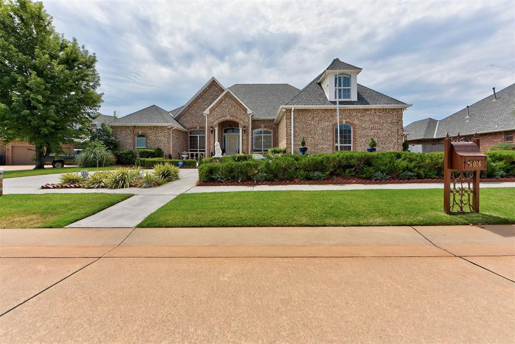 As you step through the doors of this elegant home in one of OKC’s premier gated communities, the warmth of detailed woodwork and natural light draws you in. The completely remodeled 2024 kitchen stuns with granite counters, stainless appliances, a custom backsplash, and an oversized breakfast bar that flows into a cozy dinette and one of three spacious living areas.

Downstairs, two bedrooms feature private en-suite baths, and a tucked-away study is perfect for working from home. Upstairs, you'll find a flexible bonus room—ideal as a game room or fifth bedroom—along with two additional bedrooms and baths. The primary suite is a true retreat with its own fireplace, spa-like bathroom, and generous walk-in closet.

Thoughtfully updated with spray foam insulation, zoned HVAC, newer hot water tanks, a 50-year roof, and a walk-in storm shelter, this home blends comfort, efficiency, and peace of mind. The beautifully landscaped yard with full sprinkler system completes the tour.

Come see where space, style, and location meet—you won’t want to leave.