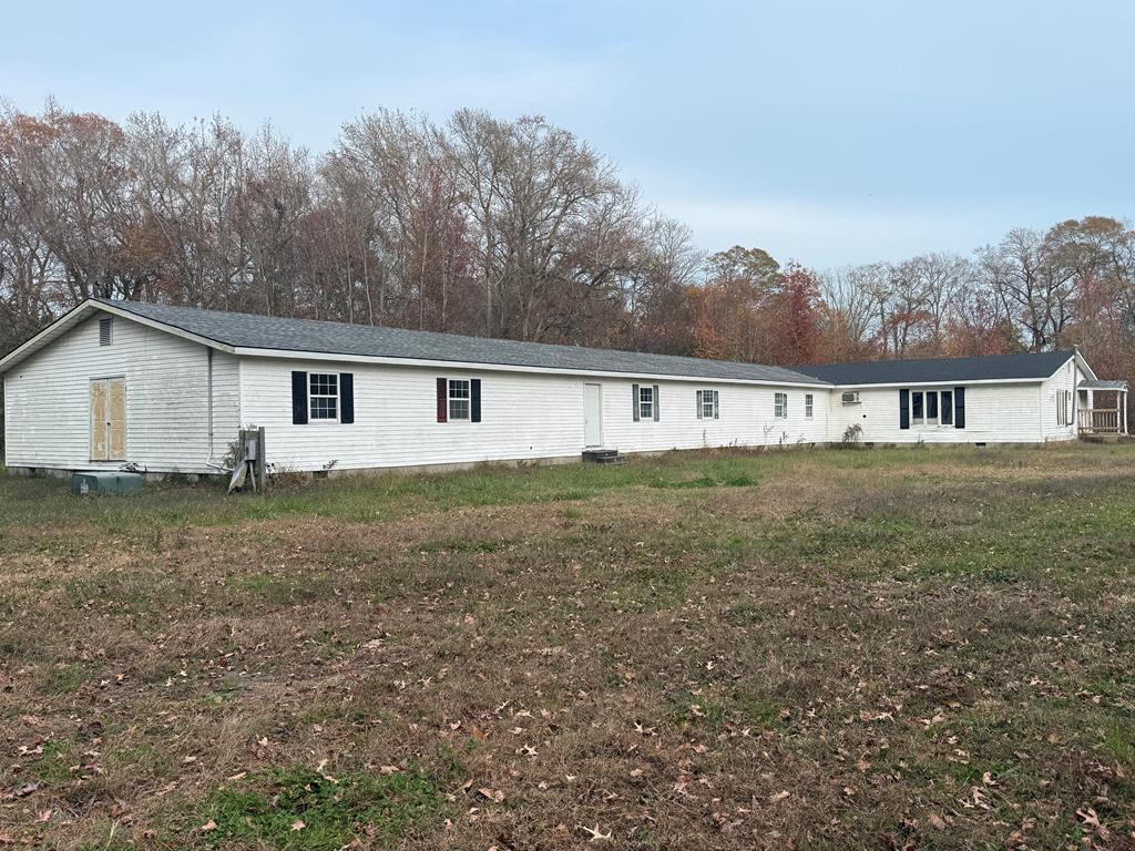 Great investment opportunity! Property has been completely gutted out. Opportunities are endless. Sits on 3 acres.