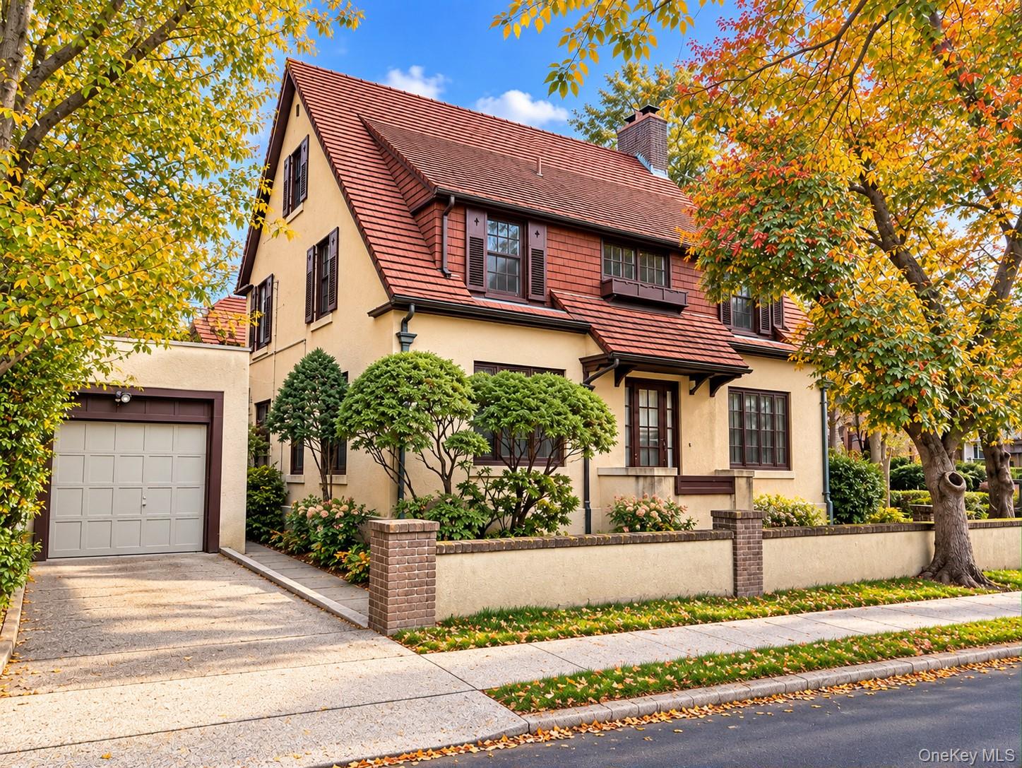 Welcome to this detached one-family home on Ivy Close in Forest Hills Gardens, featuring classic architectural character, a stucco-and-brick exterior, five bedrooms, 2.5 bathrooms, and a detached garage.The first floor offers a spacious living room with a wood-burning fireplace, an adjacent sunroom, a formal dining room, and a large kitchen. The second floor includes three bedrooms and a full bathroom. The third floor provides two additional sizable bedrooms and a full bathroom. The basement contains a half bathroom, laundry facilities, and ample storage space.Community services include maintenance of private community streets, community security services, and snow removal for community streets and sidewalks. The property offers access to Austin Street shopping and dining, E and F express subway service at Forest Hills–71 Av, and the Forest Hills Long Island Rail Road station. Nearby P.S. 101 School in the Gardens is a neighborhood resource; school zoning and enrollment eligibility should be independently verified.A distinctive opportunity to make this residence your own in Forest Hills Gardens.