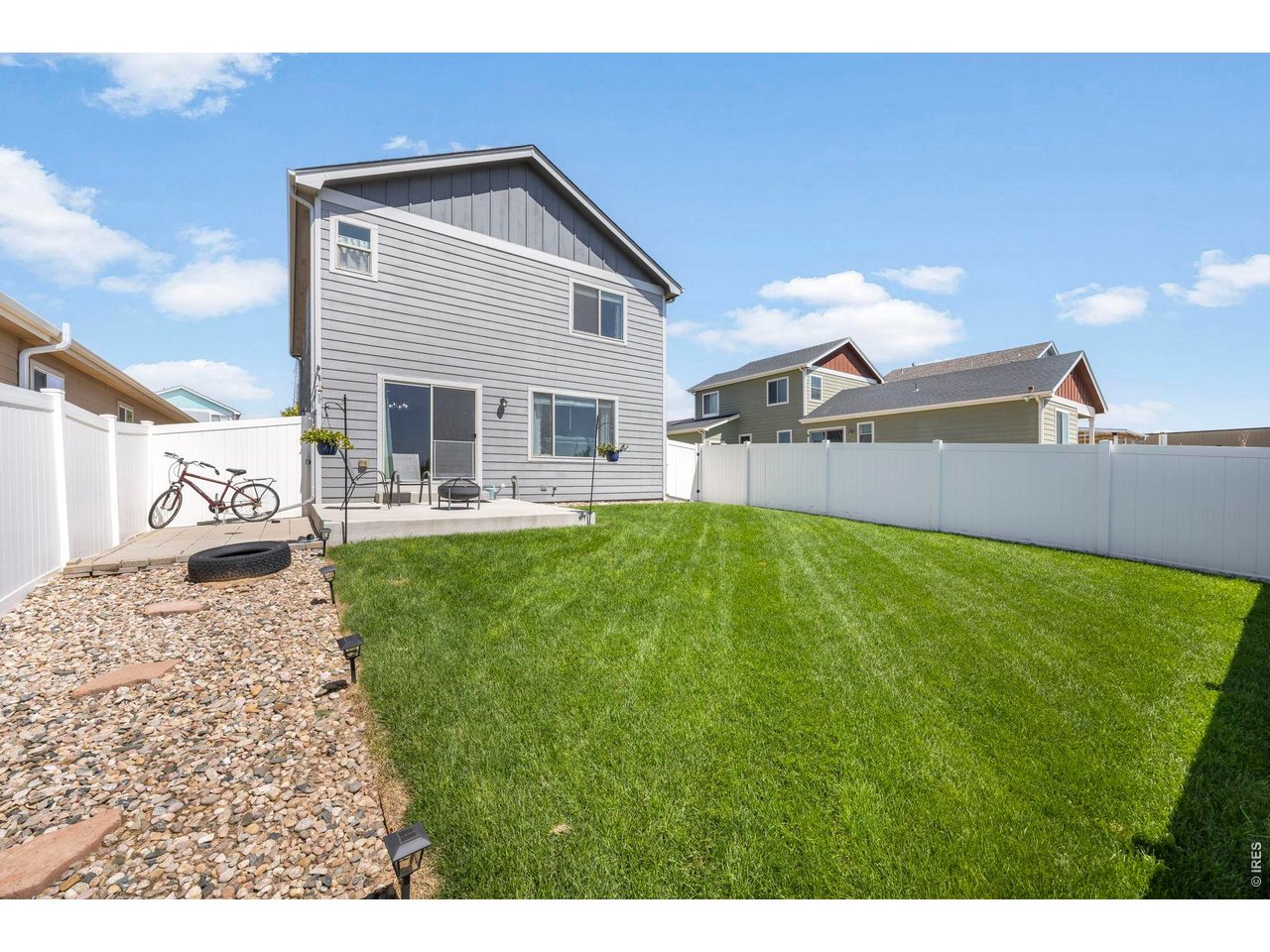 We invite your consideration of this attractive three-bedroom, two-and-a-half-bathroom residence, complete with an attached two-car garage, situated in Evans, Colorado. This property features an open-concept living space, an upstairs laundry facility conveniently co-located with the three bedrooms, and an unfinished basement. The well-maintained backyard includes a cement patio, ideal for grilling and entertaining.