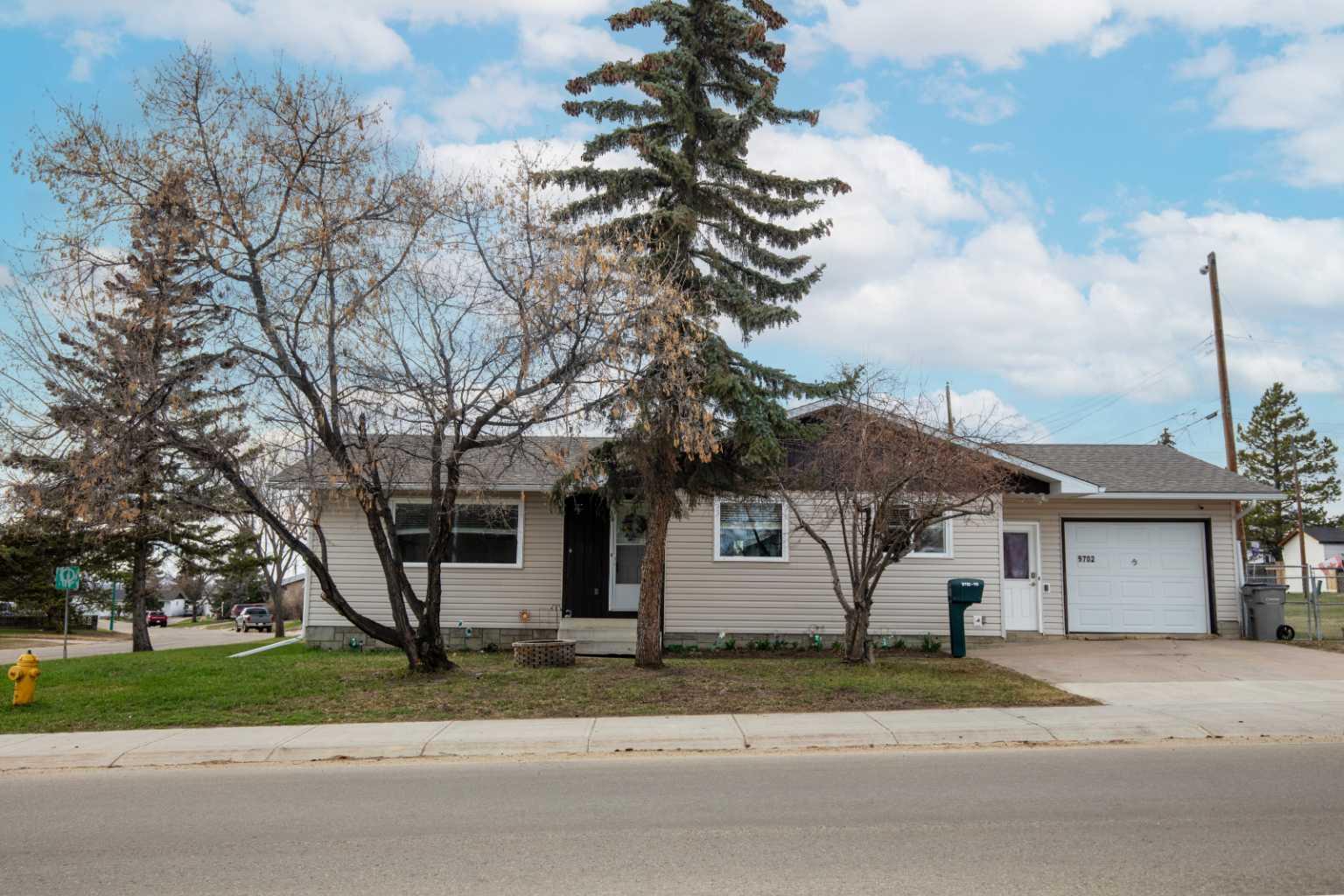 Very well-maintained home located in the desirable community of Crystal Ridge. This spacious property offers 3 bedrooms up and 2 additional bedrooms down, along with 2.5 bathrooms, making it ideal for families of all sizes. Convenient main floor laundry adds to the home’s functionality. Over the years, numerous upgrades have been completed, including flooring, paint, toilets on main floor,  siding, shingles, and hot water tank—providing peace of mind and modern comfort. The basement is partially developed and features a 3-piece bathroom and two bedrooms that require flooring, with the remaining space open and ready for your future development ideas. Situated on a corner lot, the property boasts a fenced yard, concrete driveway, and a large 16' x 26' single garage. A great opportunity to own a move-in-ready home with room to grow in a desirable family neighborhood.