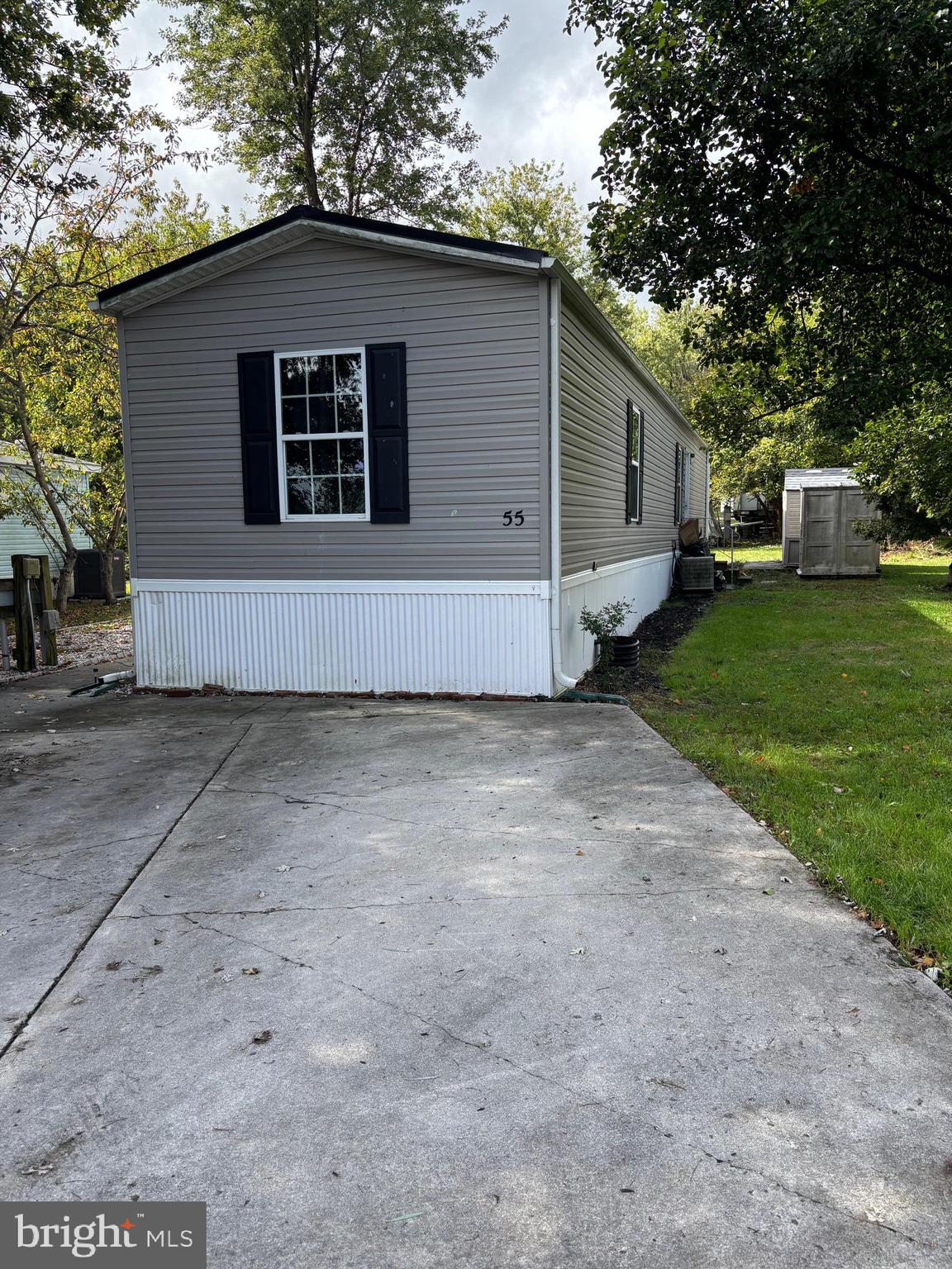 Round Top Mobile Home Park Unit #55 – 924 sq. ft. home featuring 3 bedrooms and 2 full baths. Recently updated with a newly renovated kitchen, new appliances, and LVP flooring except bedrooms. Primary suite offers a walk-in closet and an updated bath with new tub/shower and vanity. Additional highlights include a 2020 roof, new stackable washer and dryer, shed, and concrete patio for outdoor enjoyment. Conveniently located just minutes from Rt. 15 and Historic Gettysburg. Move-in ready and beautifully refreshed!