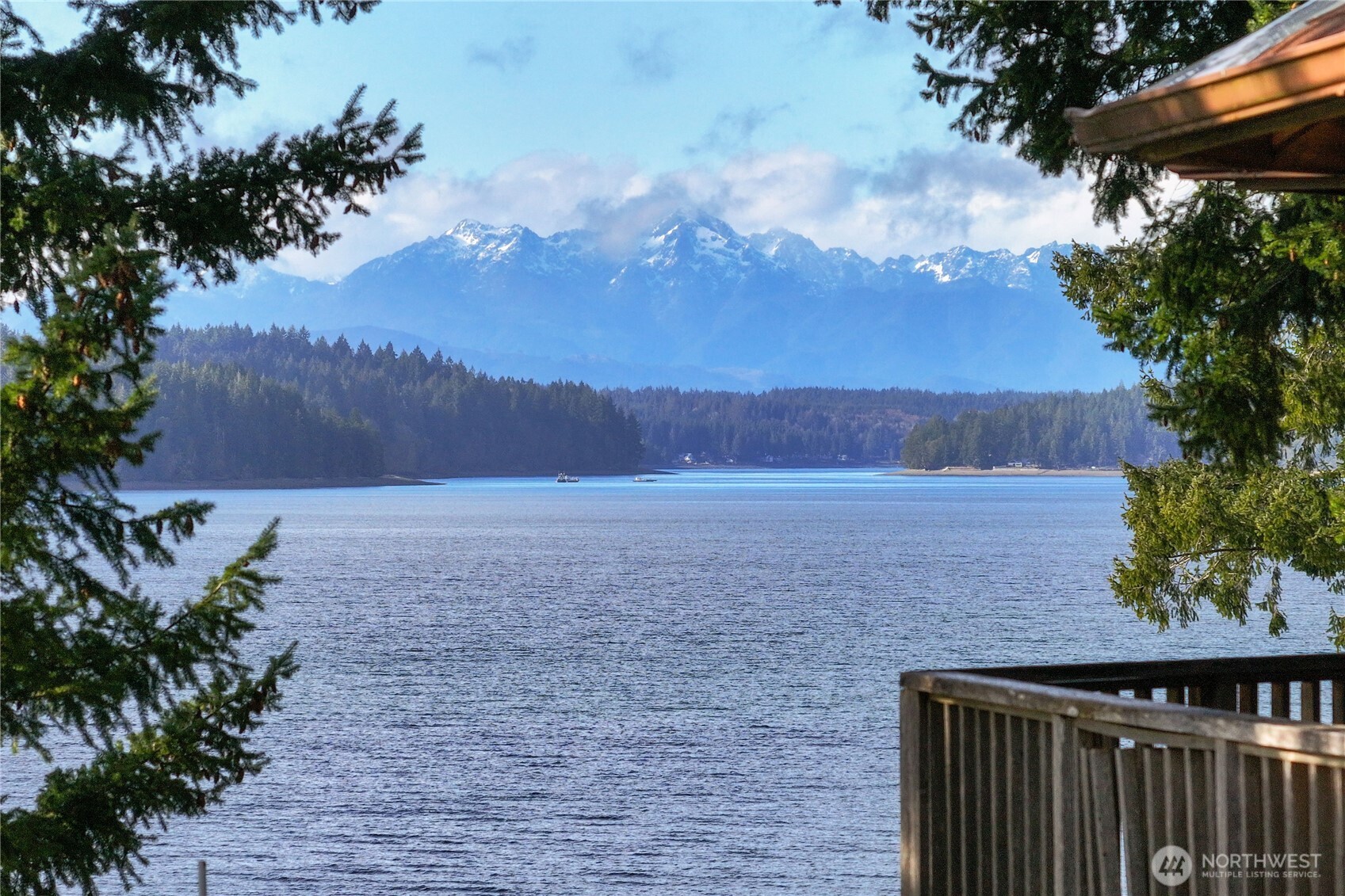 Welcome to your own slice of Pacific Northwest waterfront living on beautiful Harstine Island. This 3-bedroom, 2-bath home sits on nearly 4 acres across two parcels, offering 120 feet of private shoreline with breathtaking views of Squaxin Island and the Olympic Mountains.  Spend your days soaking in the peaceful setting, watching boats pass by, and enjoying unforgettable sunsets from your own beach. Harvest clams and oysters, kayak the calm waters, or simply unwind and take in the natural beauty that surrounds you—this is true PNW living. The property also includes a gazebo and an upper shop with potential for an ADU, providing additional space and opportunity.  This property is full of potential and ready for your vision. Bring your tool belt and restore it into a stunning waterfront retreat, full-time residence, or investment opportunity. A rare chance to own acreage, privacy, and waterfront all in one—don’t miss it.